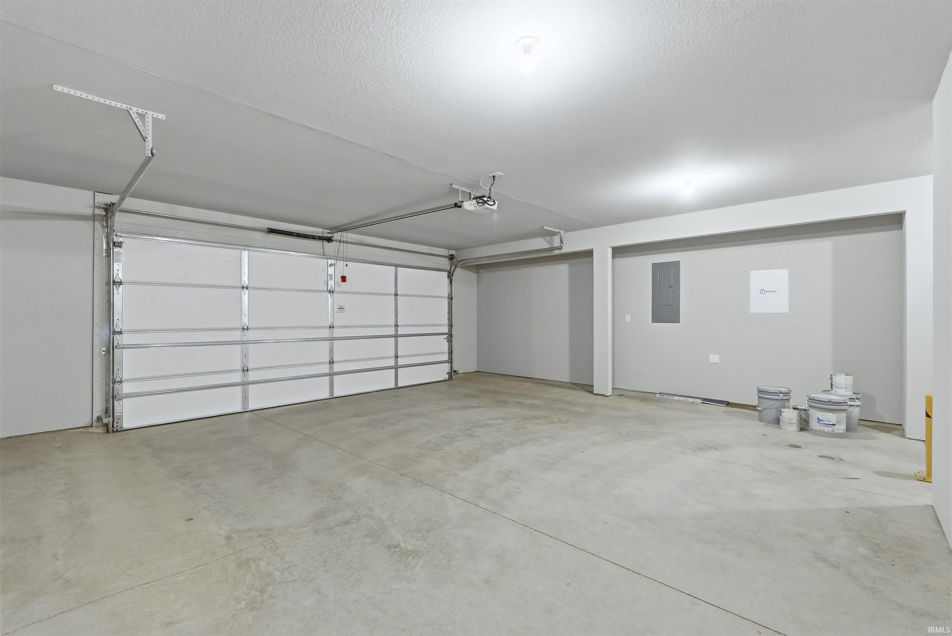 Garage featuring electric panel