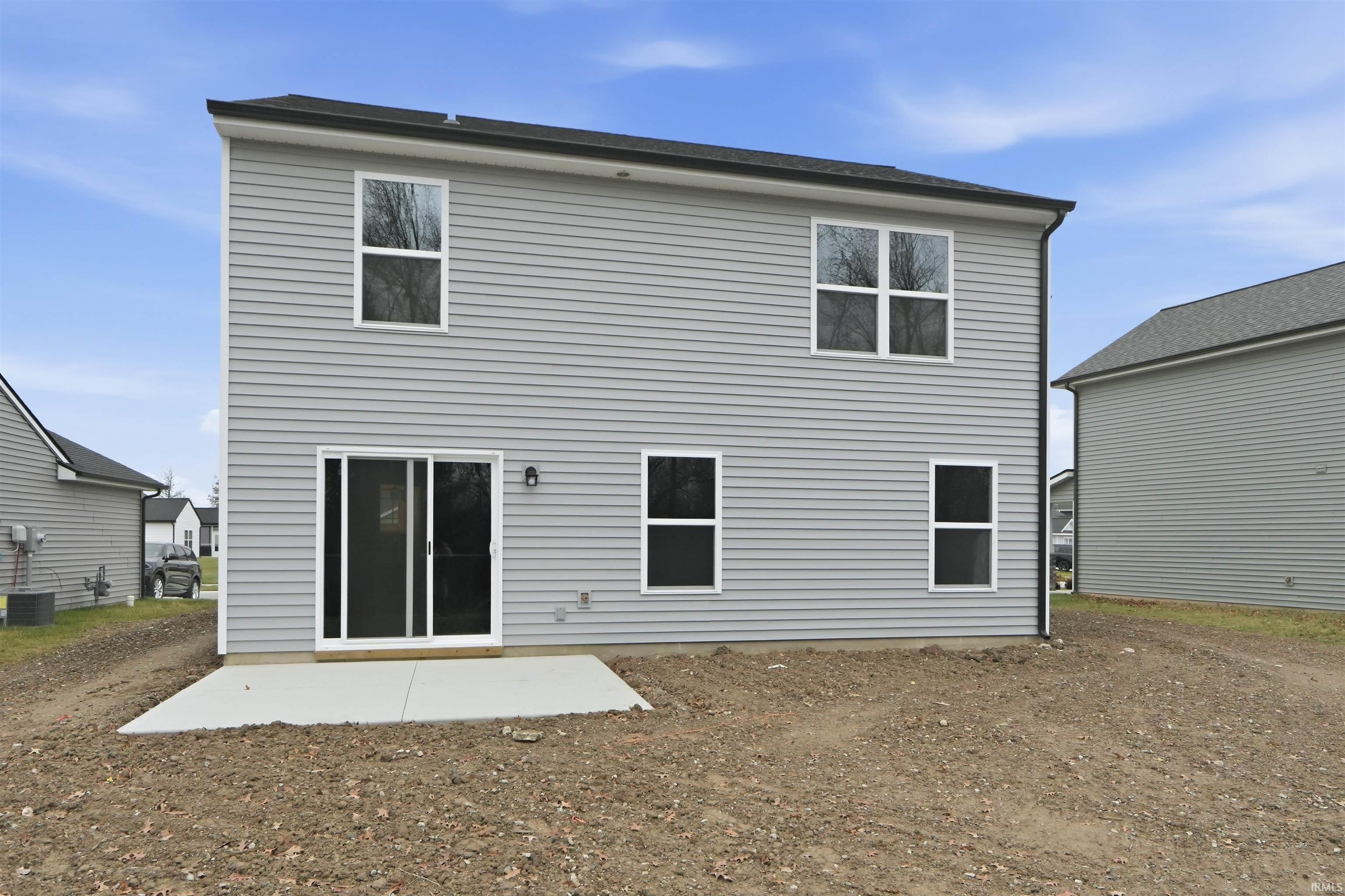 Back of property featuring a patio area