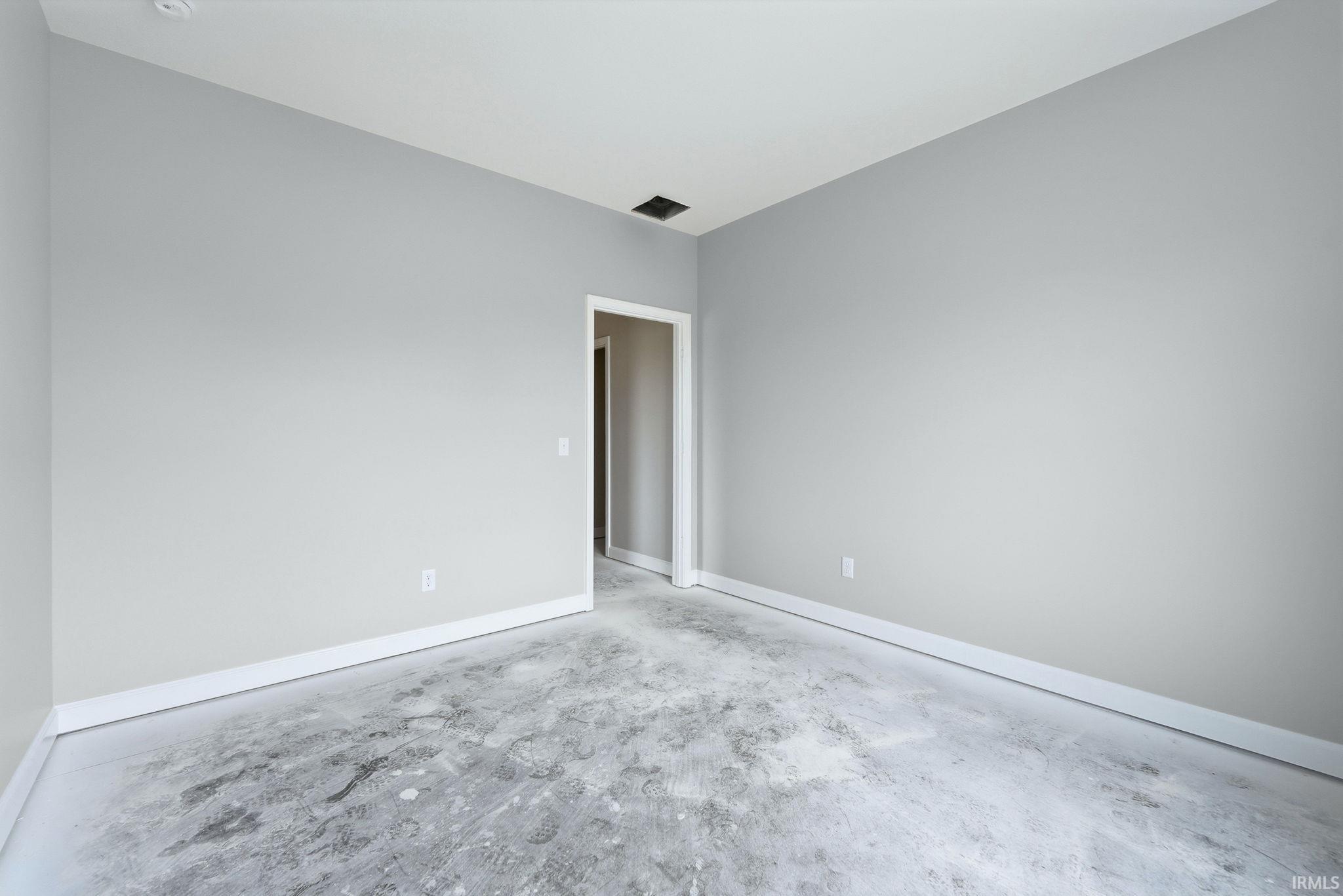 Empty room with baseboards