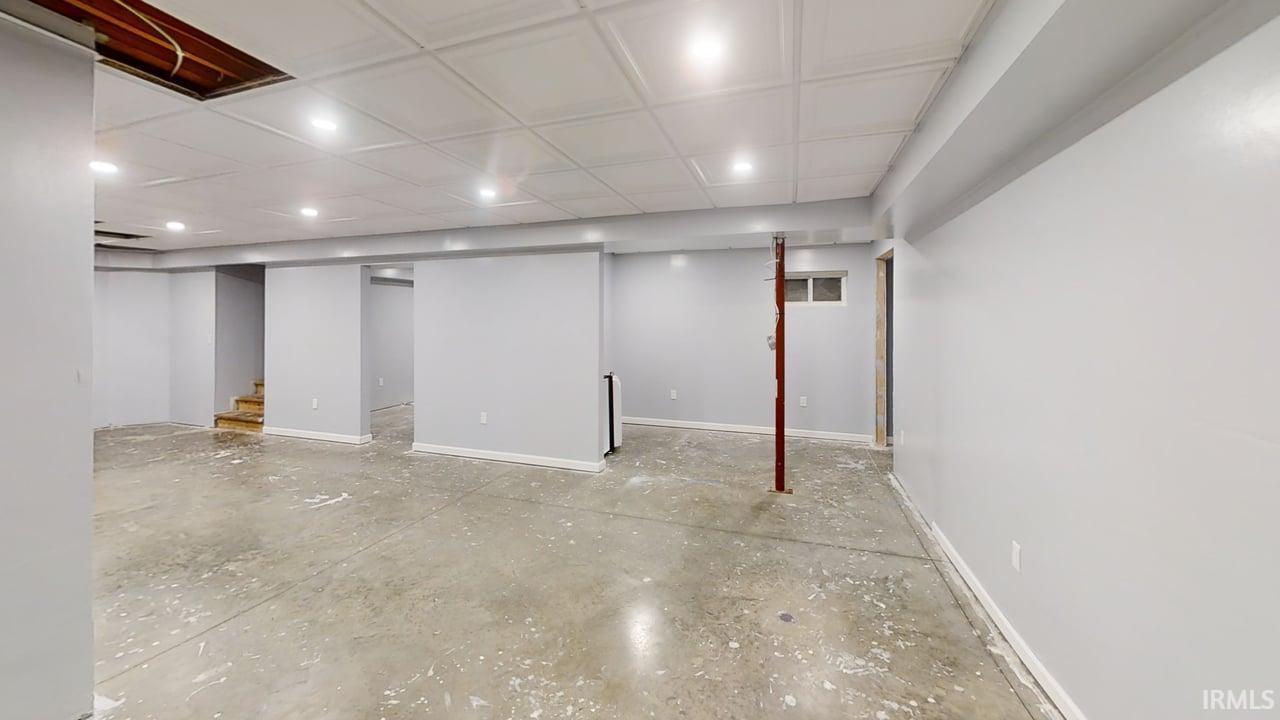 Finished basement with recessed lighting