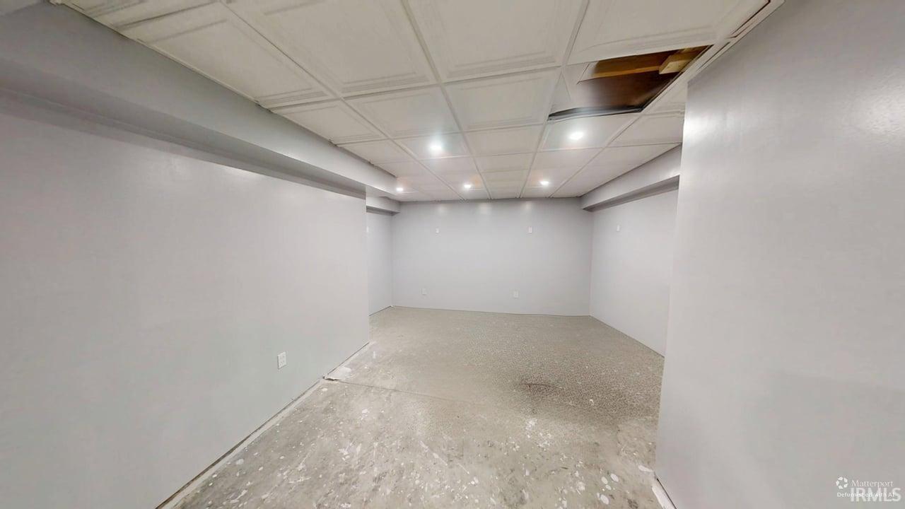 View of finished below grade area, two closet spaces