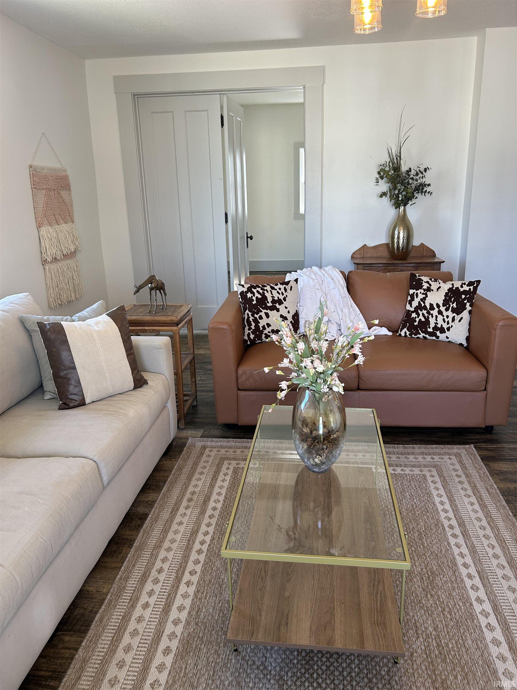 Living area with wood finished floors