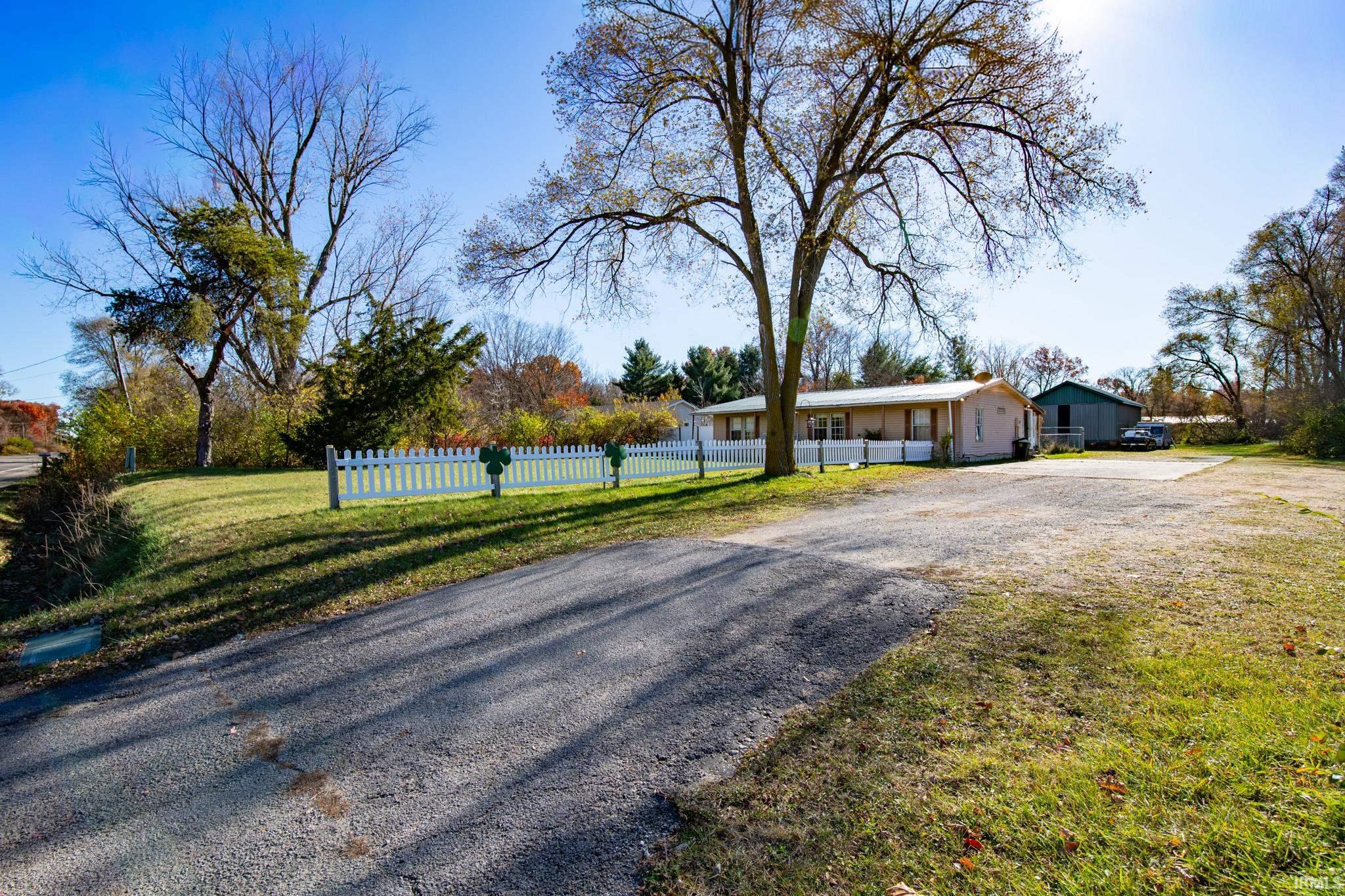 View of front of property featuring driveway