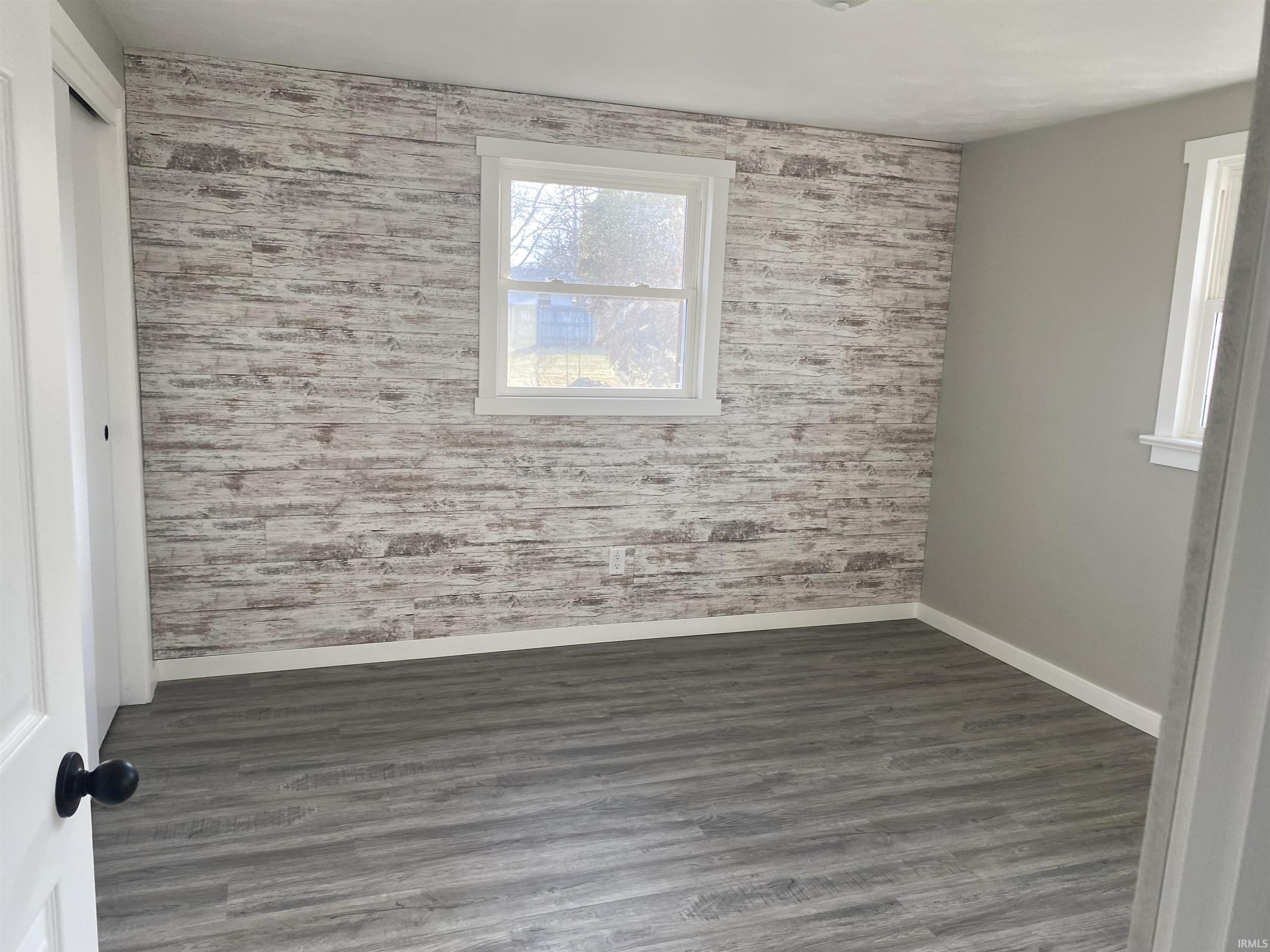 New vinyl plank laminate flooring, accent wall and repainted interior