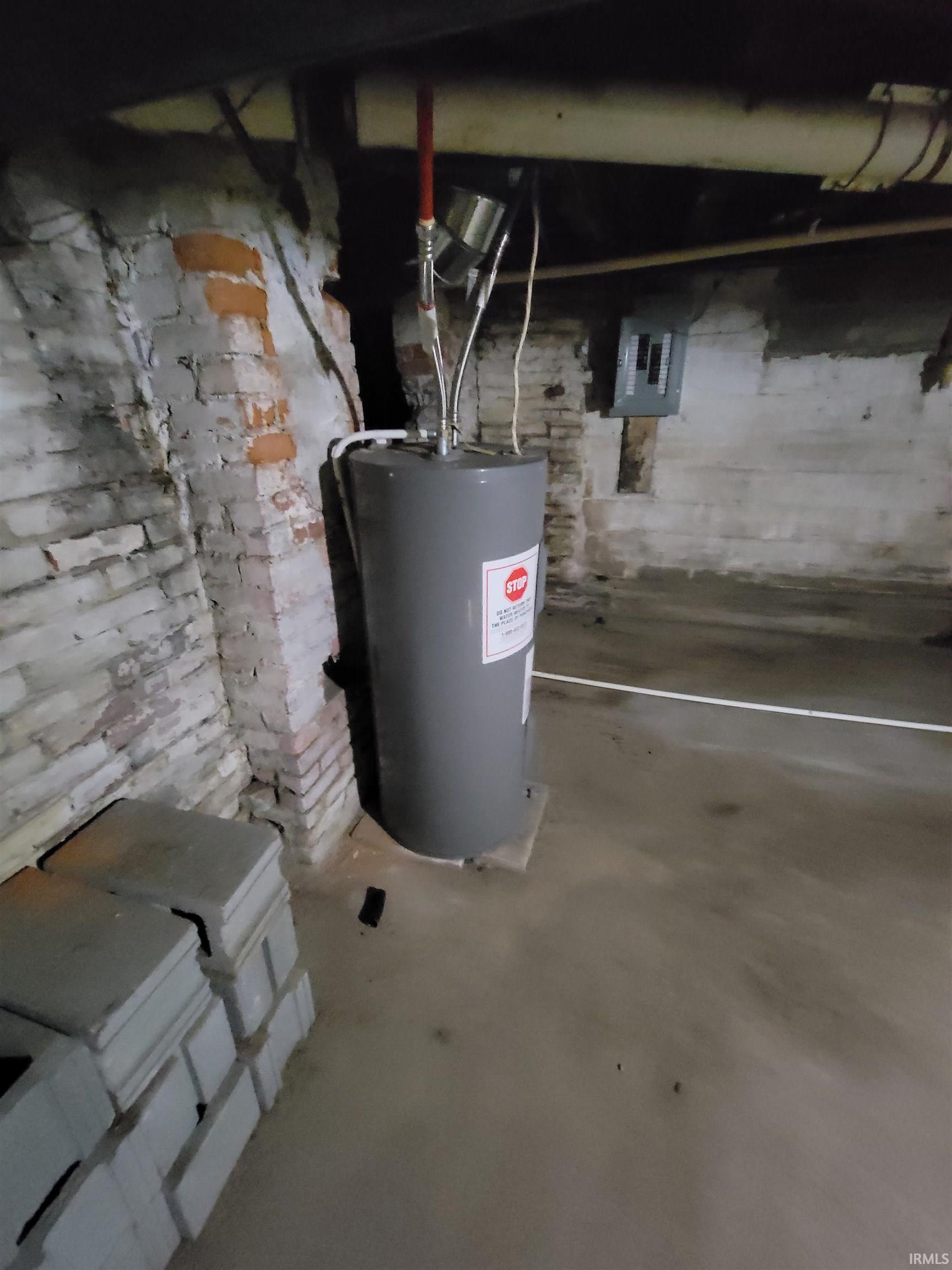 Utilities with water heater and electric panel