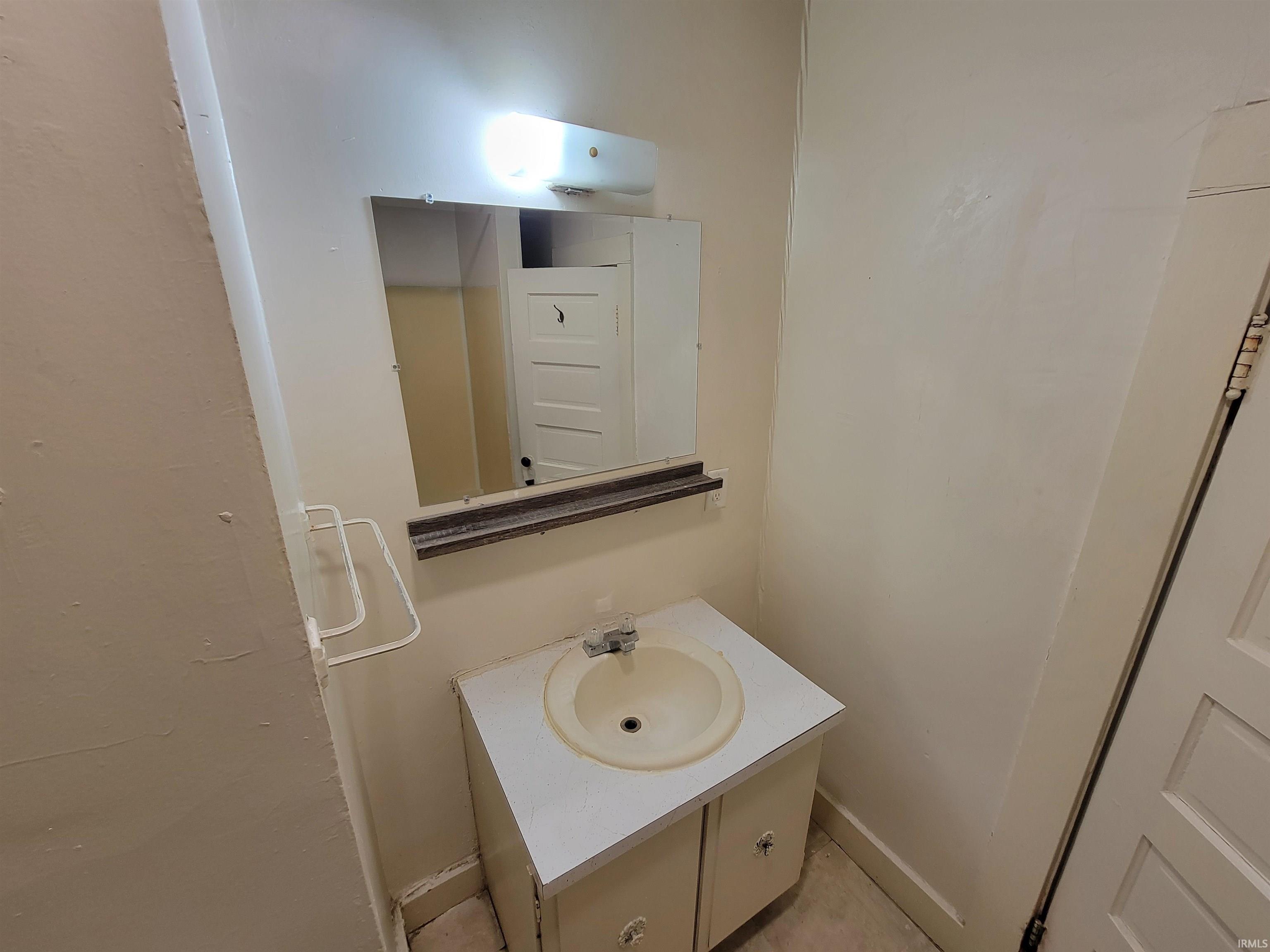 Half bathroom with vanity