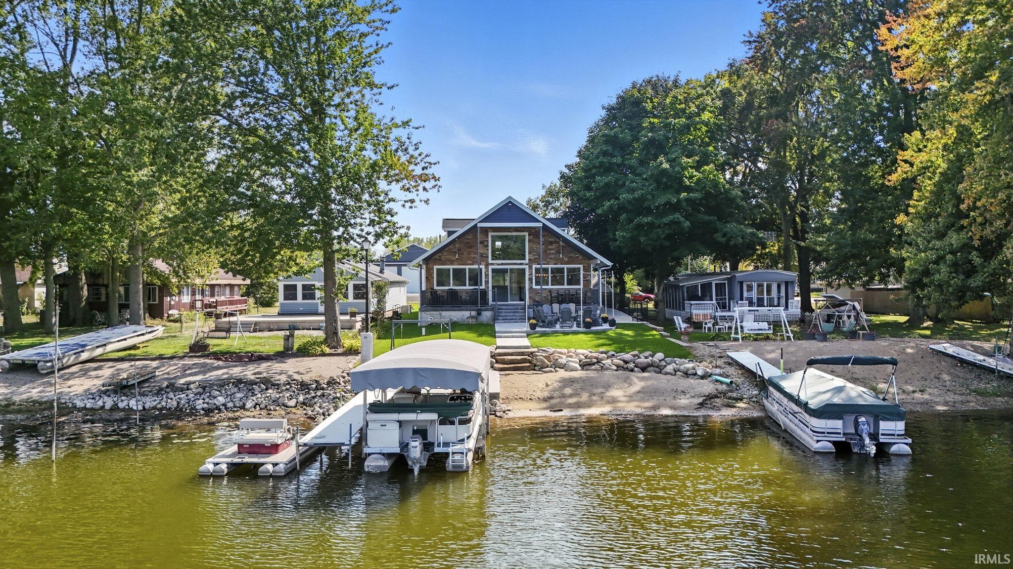 Dock with a water view and boat lift