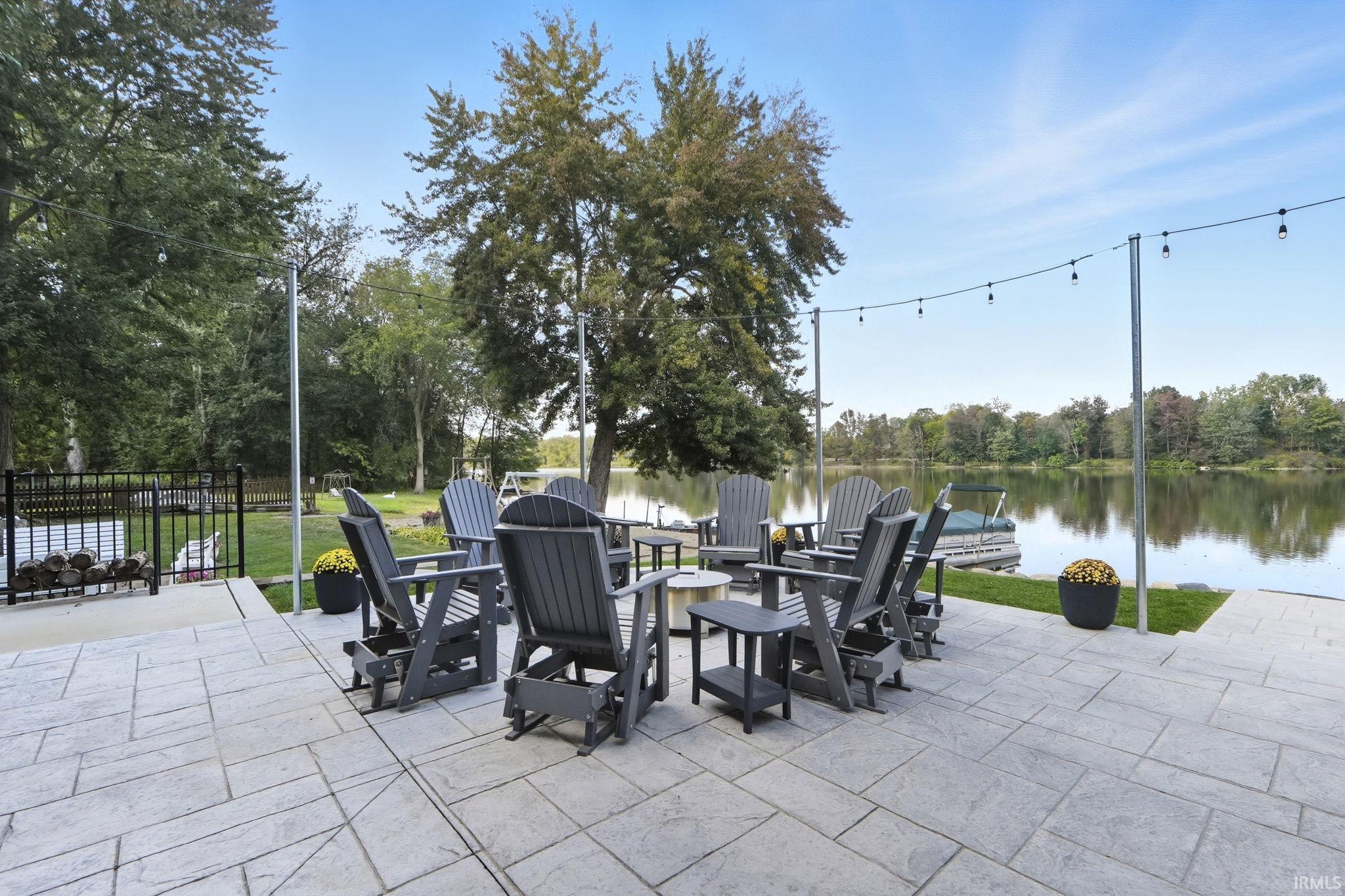 View of patio featuring a water view