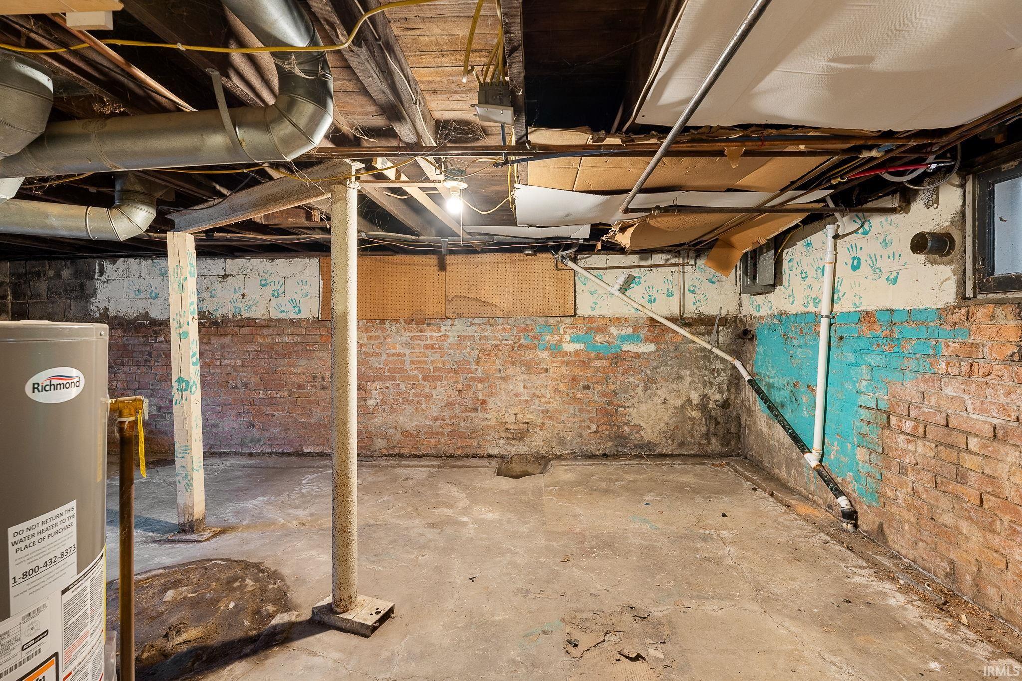 Unfinished below grade area with water heater