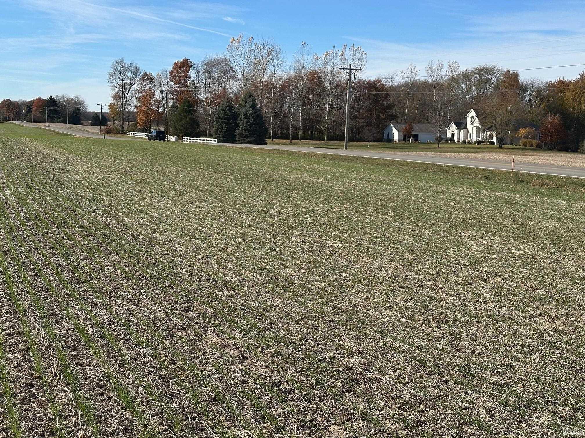 View of grassy yard with a view of countryside