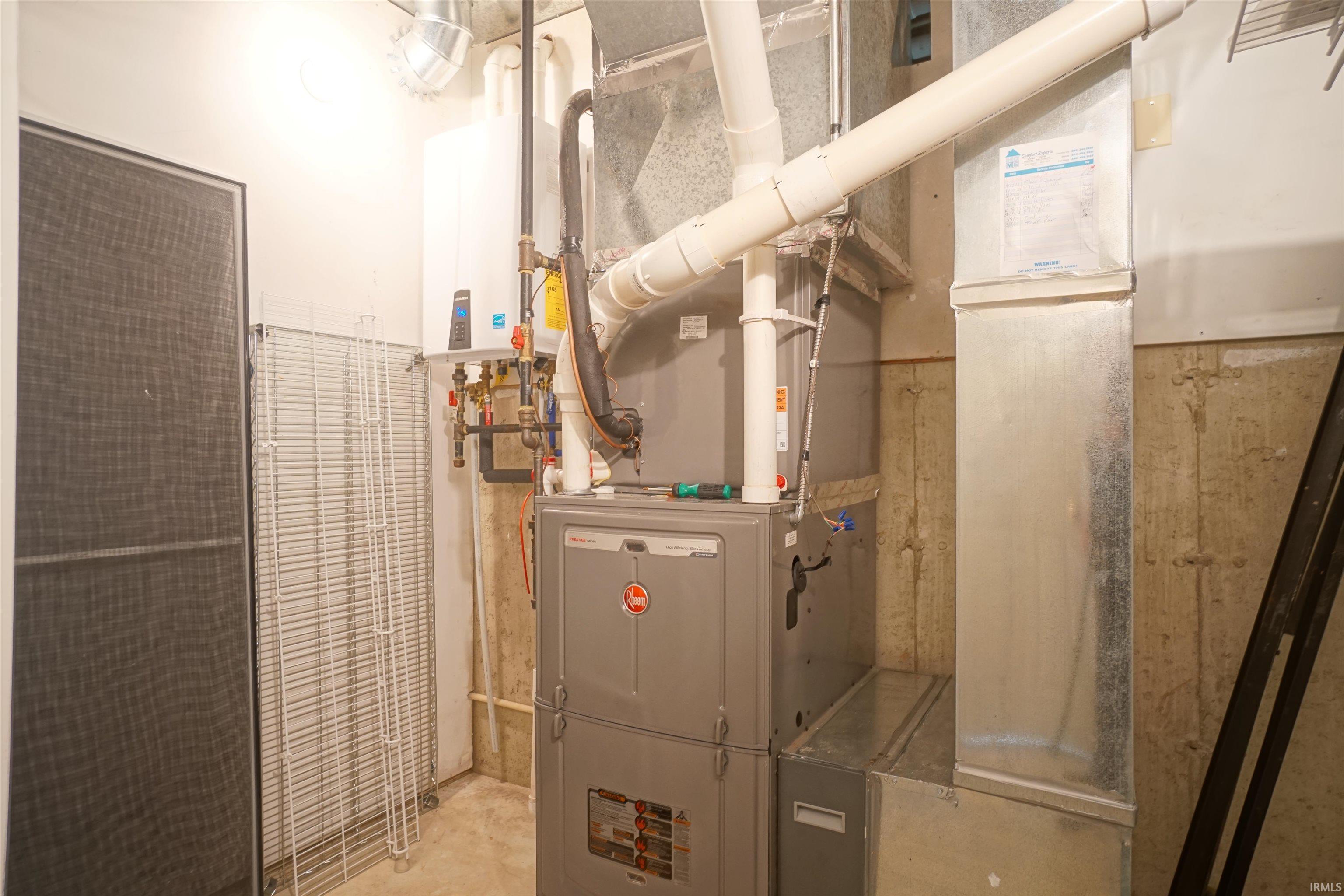 Utility room with heating unit and water heater