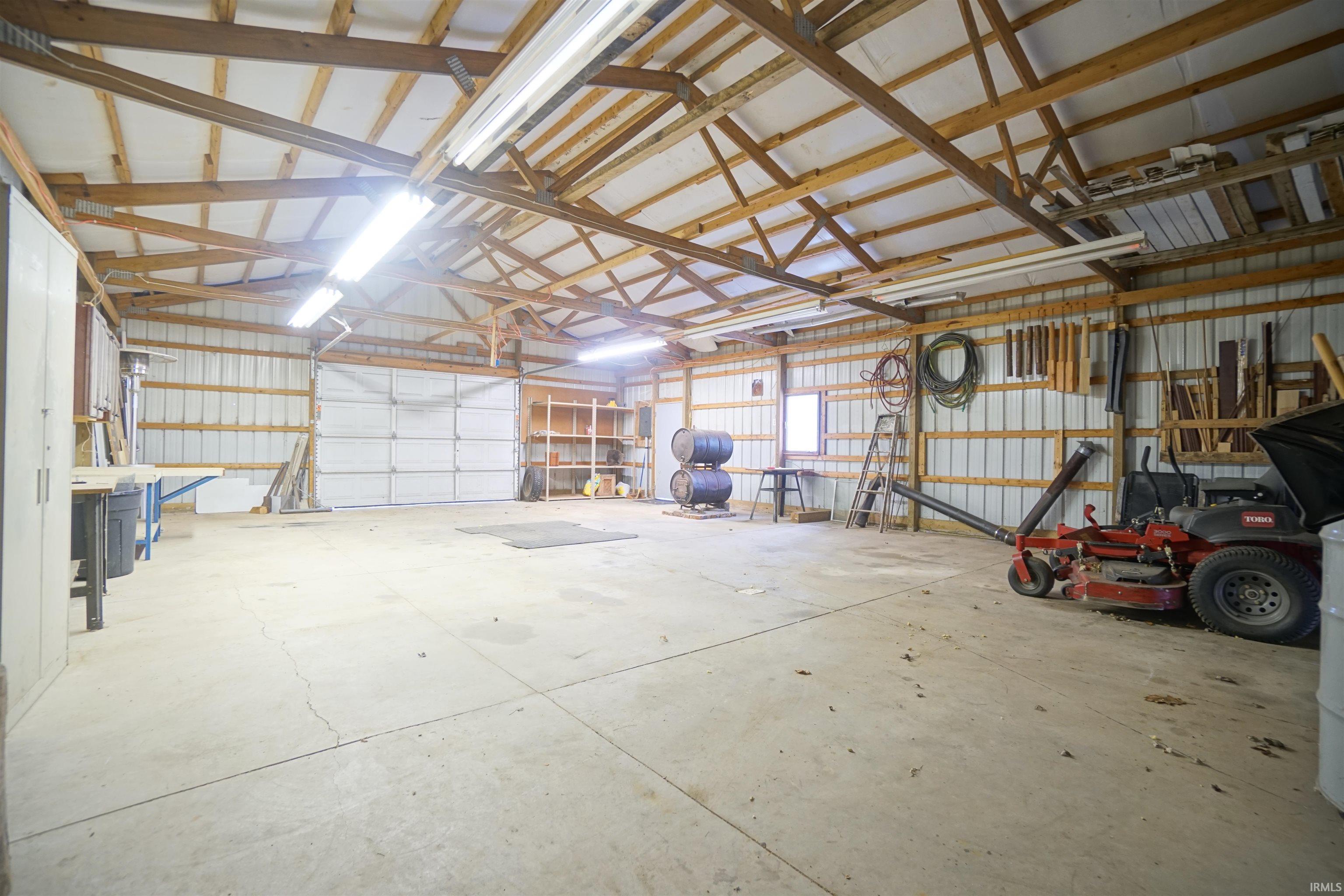 40' x 30' Pole Barn w/ 12' x 8' Overhead Door, 10' x 9' Slider Door, 100 amp Electric, Wood Burning Stove.