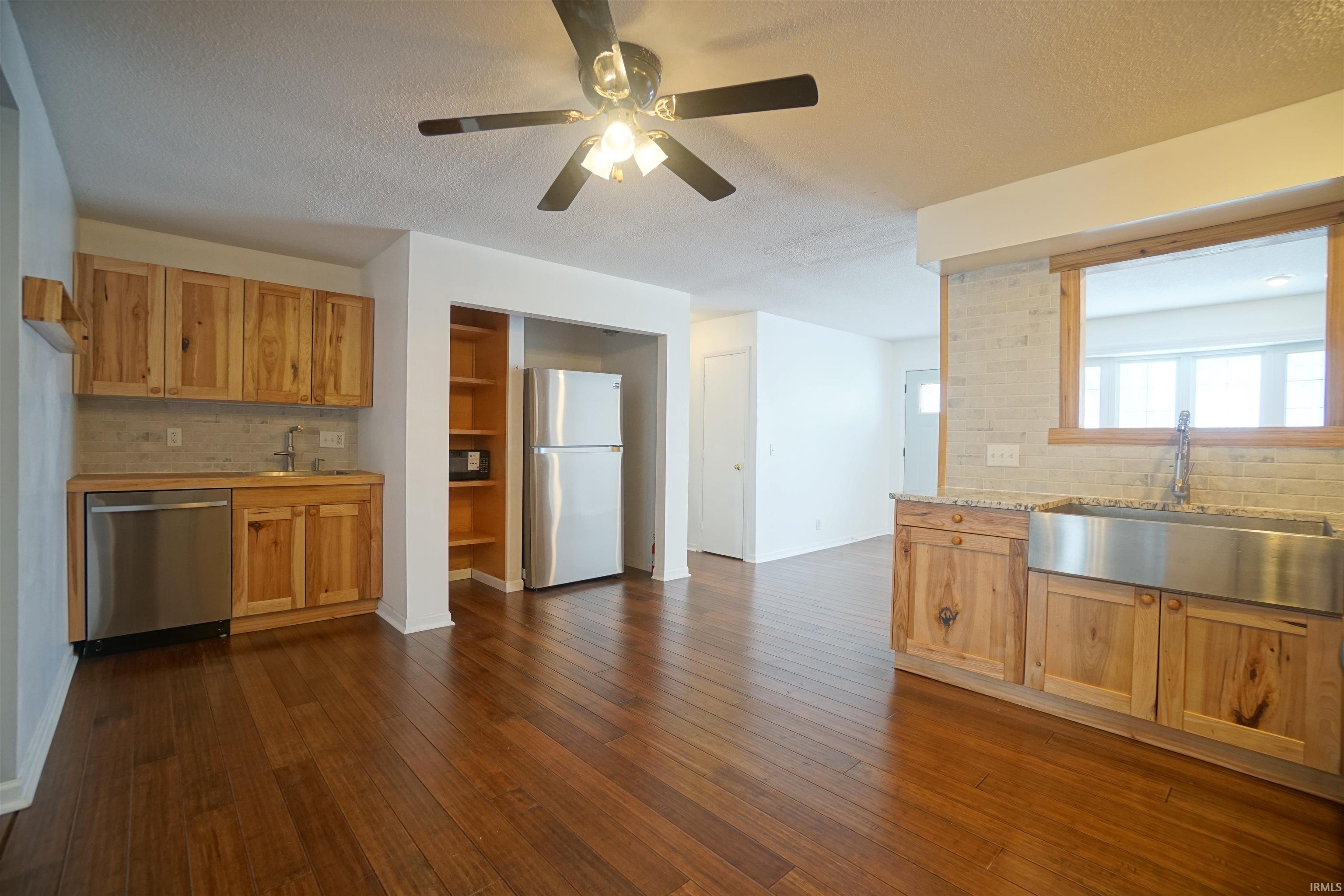 Coffee Bar with reclaimed bowling alley counter top.