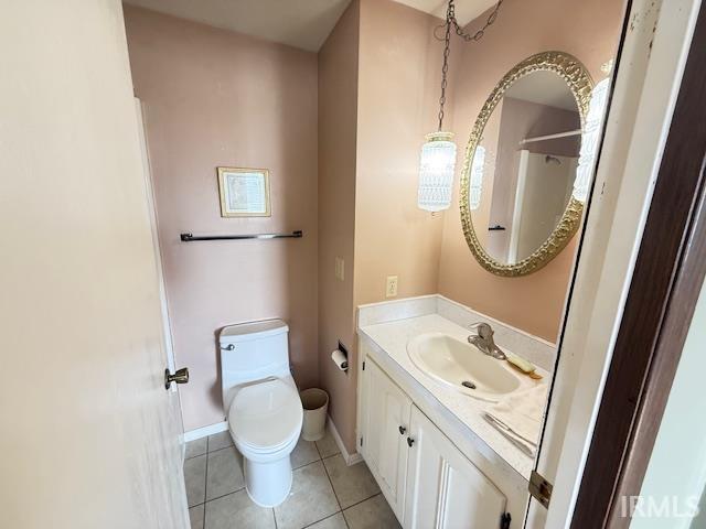 Bathroom featuring vanity and light tile patterned floors