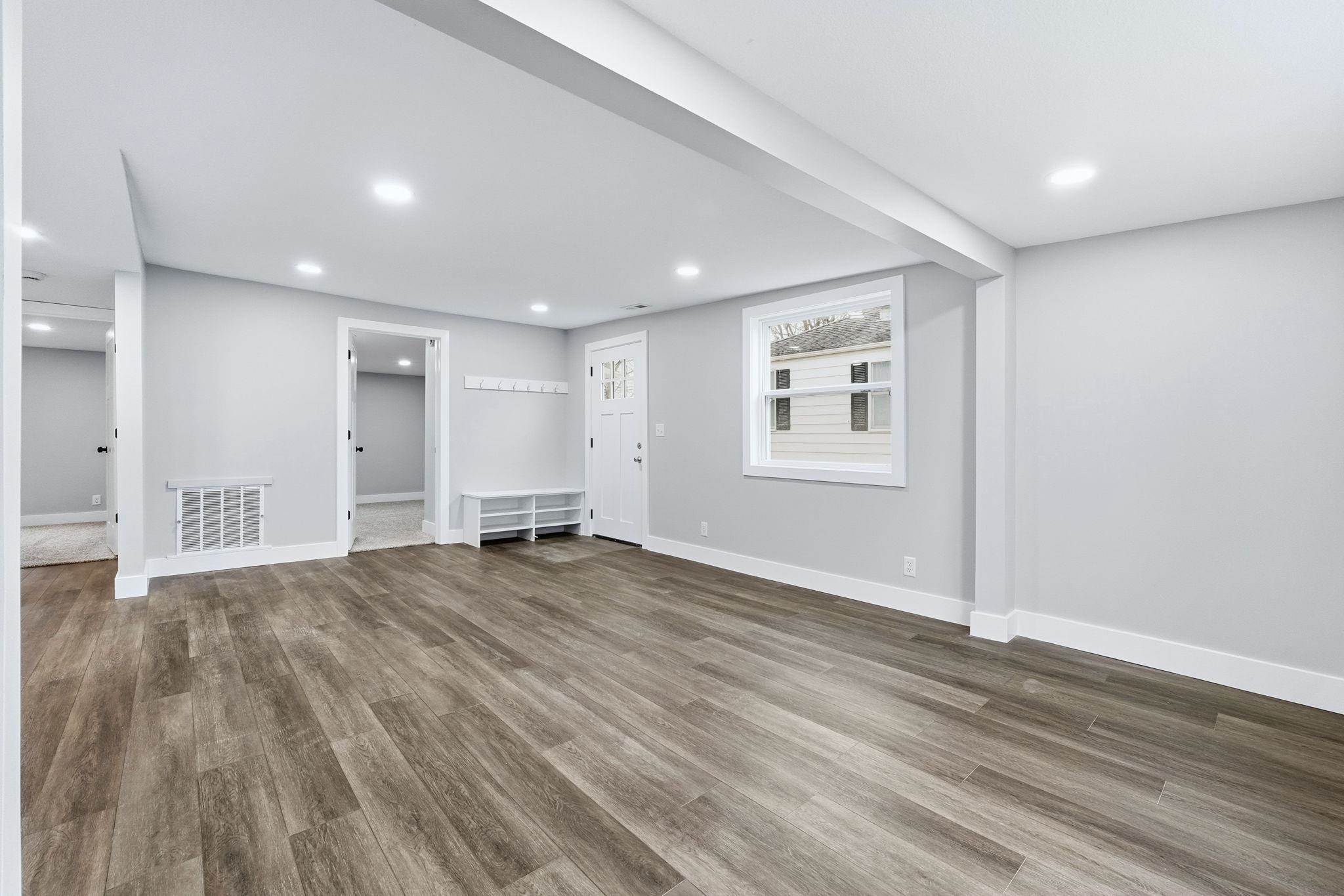 Basement featuring wood finished floors and recessed lighting