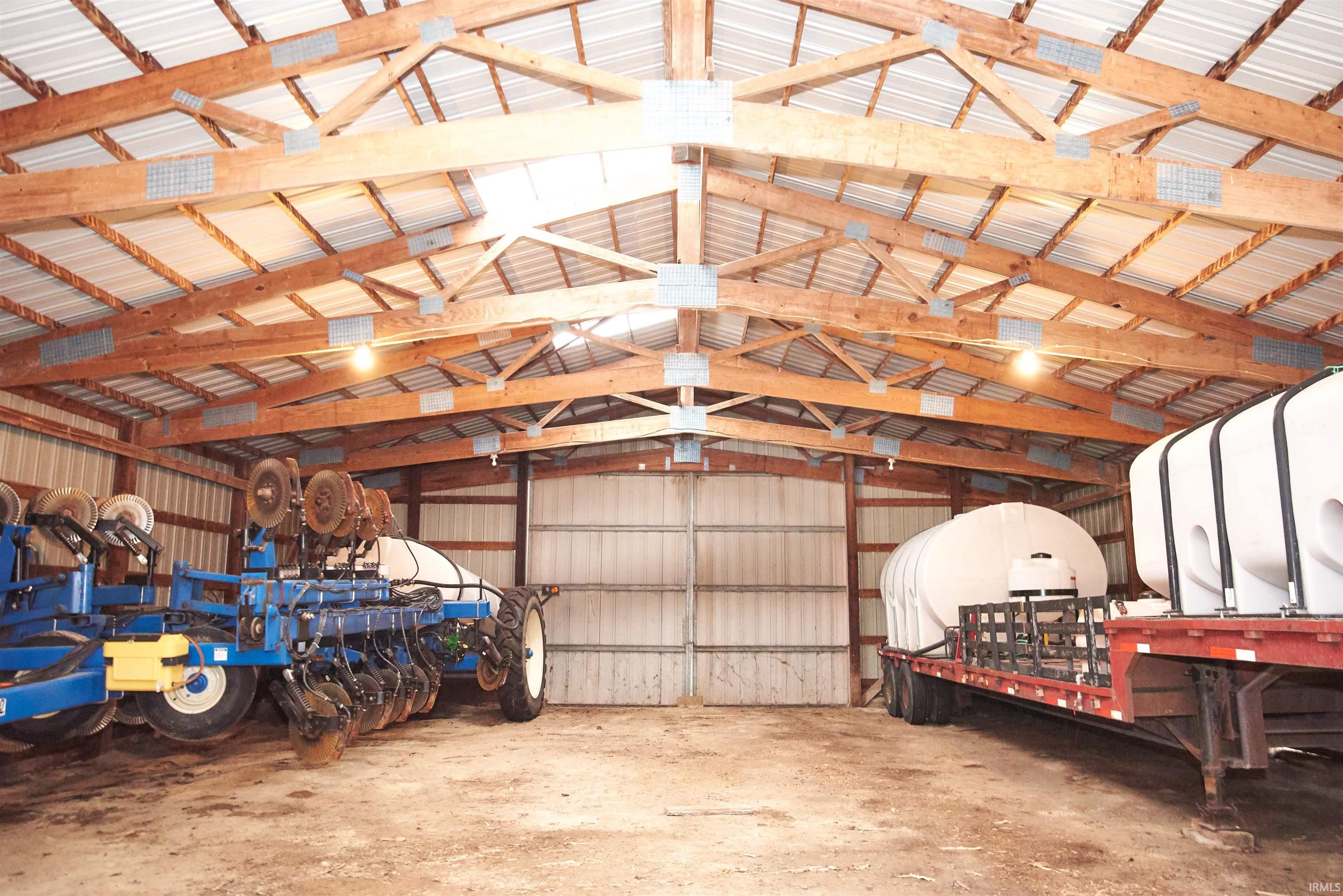 Garage featuring metal wall
