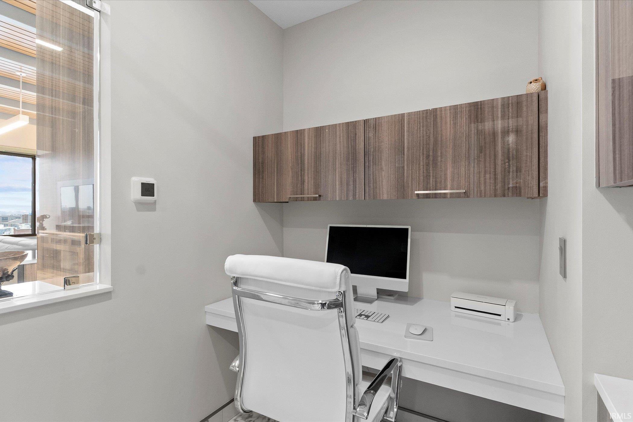 Office area with built in desk