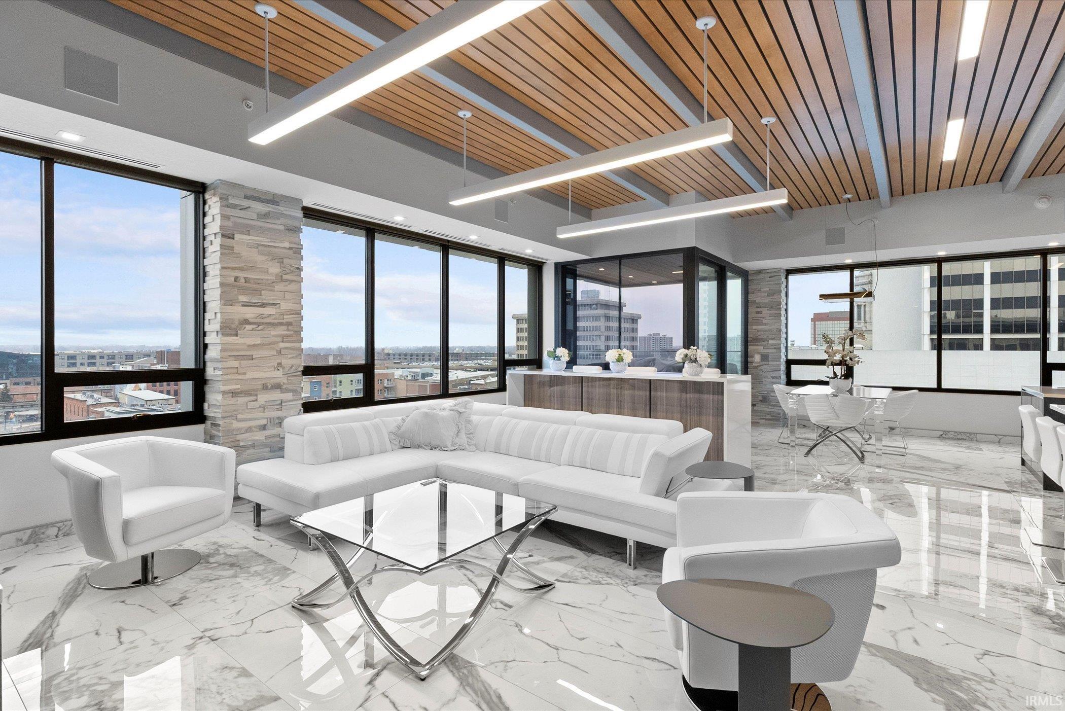 Living Room with a city view and a wooden ceiling with exposed beams