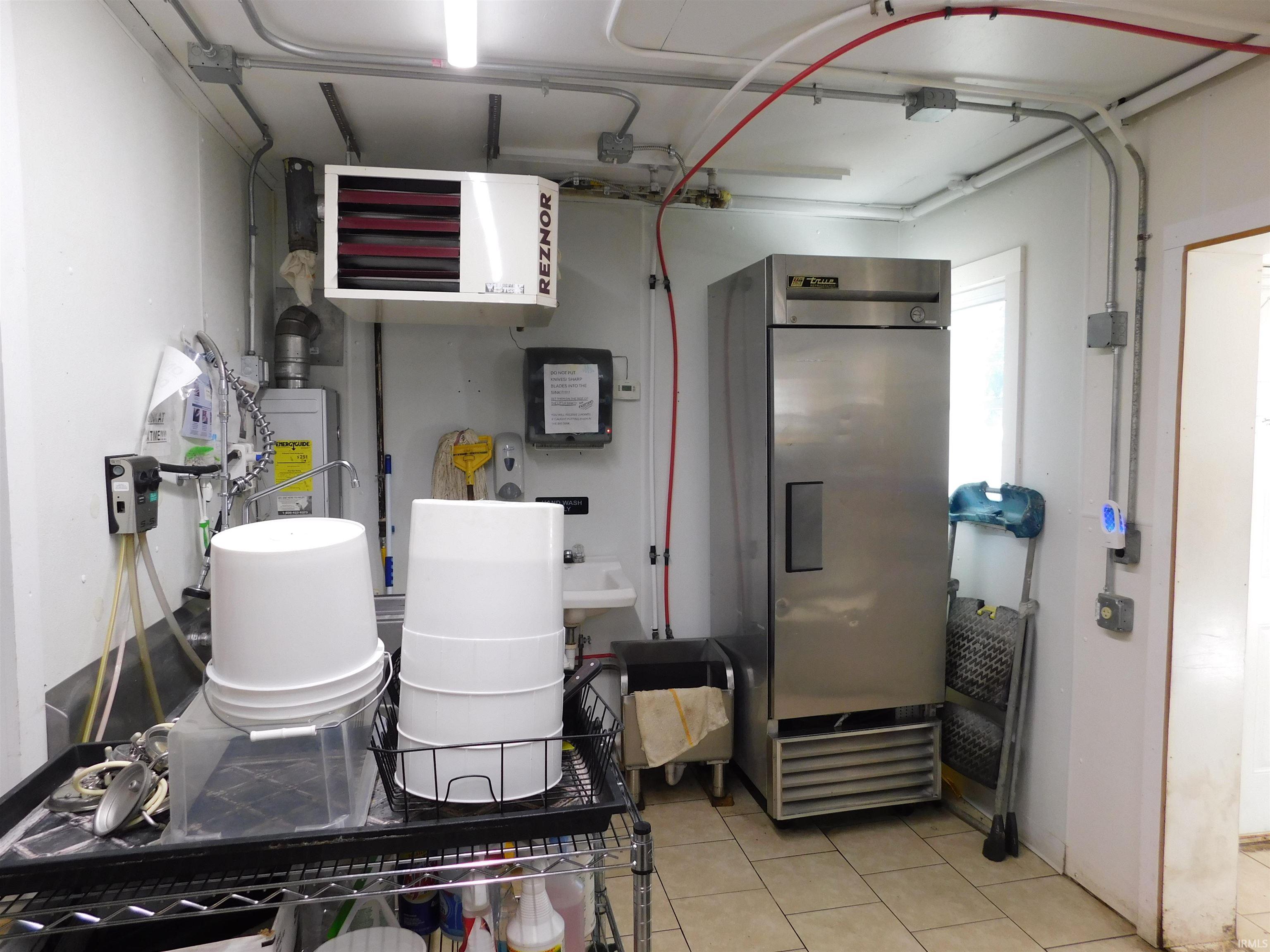 Utilities with water heater and a heating unit