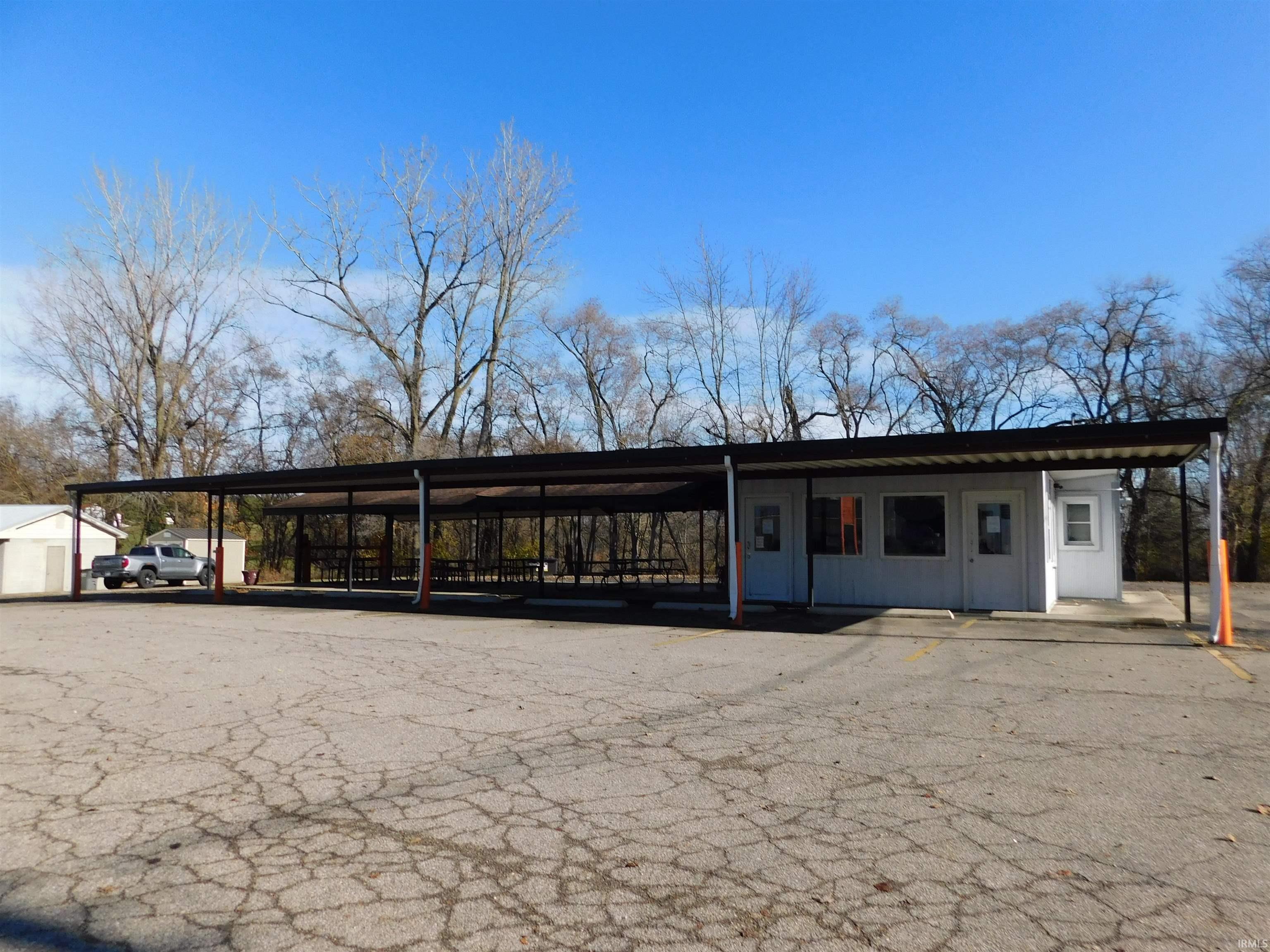 View of front of home featuring covered parking