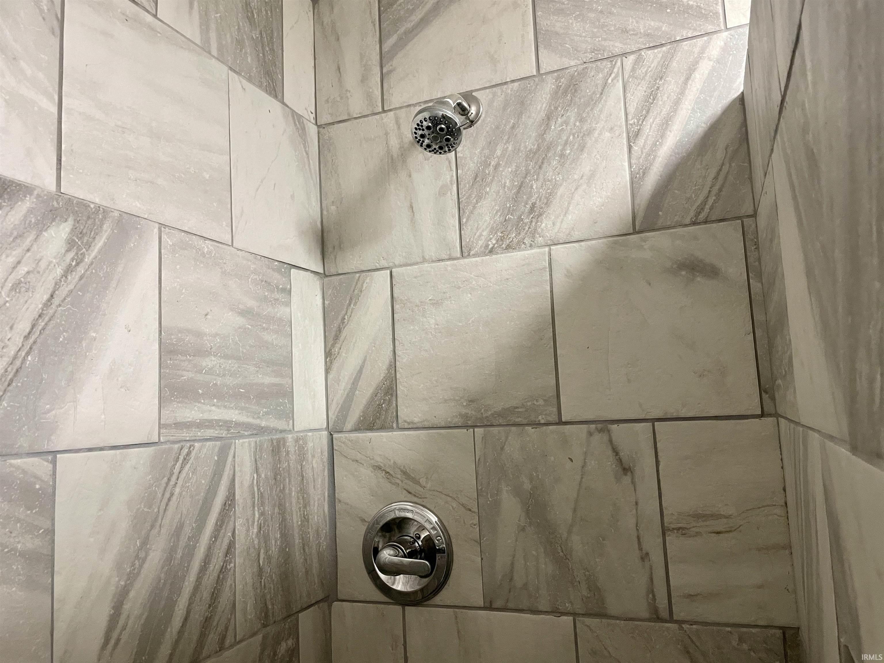 Bathroom view of tiled shower