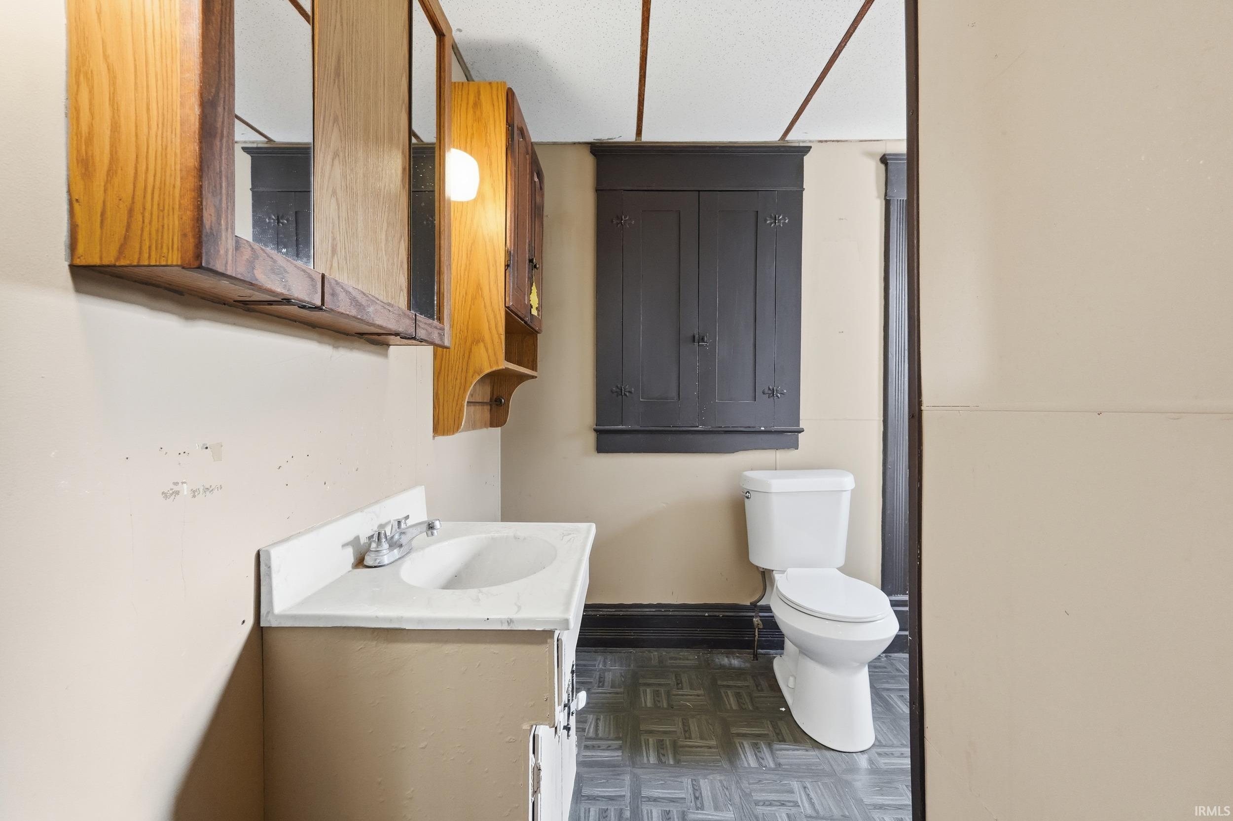 Bathroom with vanity and toilet