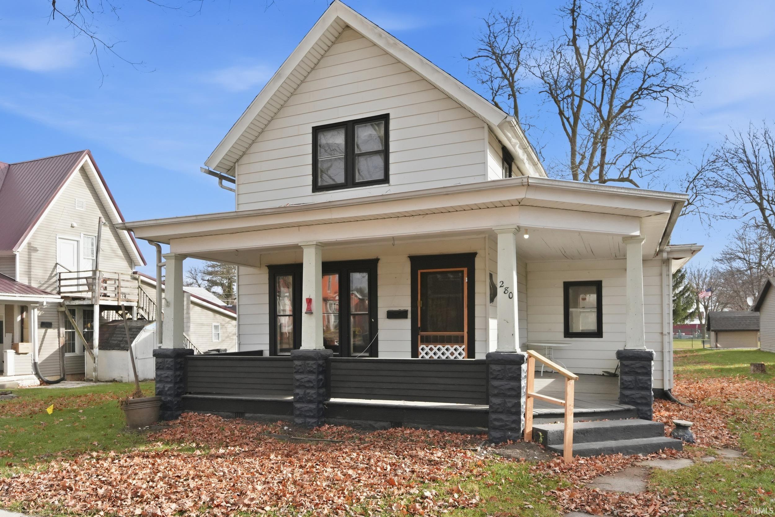 View of front of house featuring covered porch
