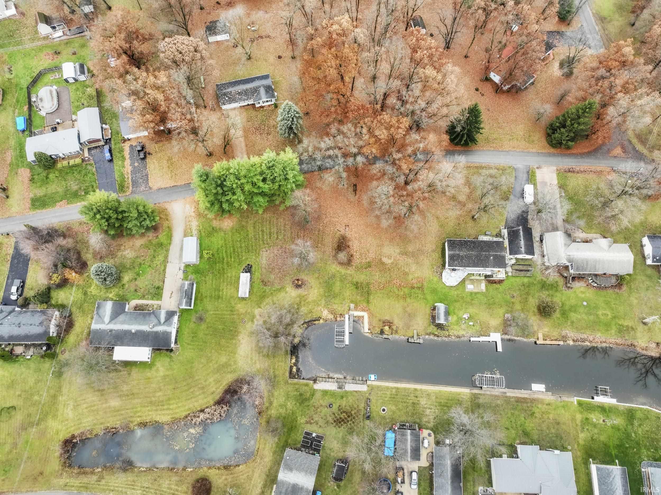 View of property location with a nearby body of water