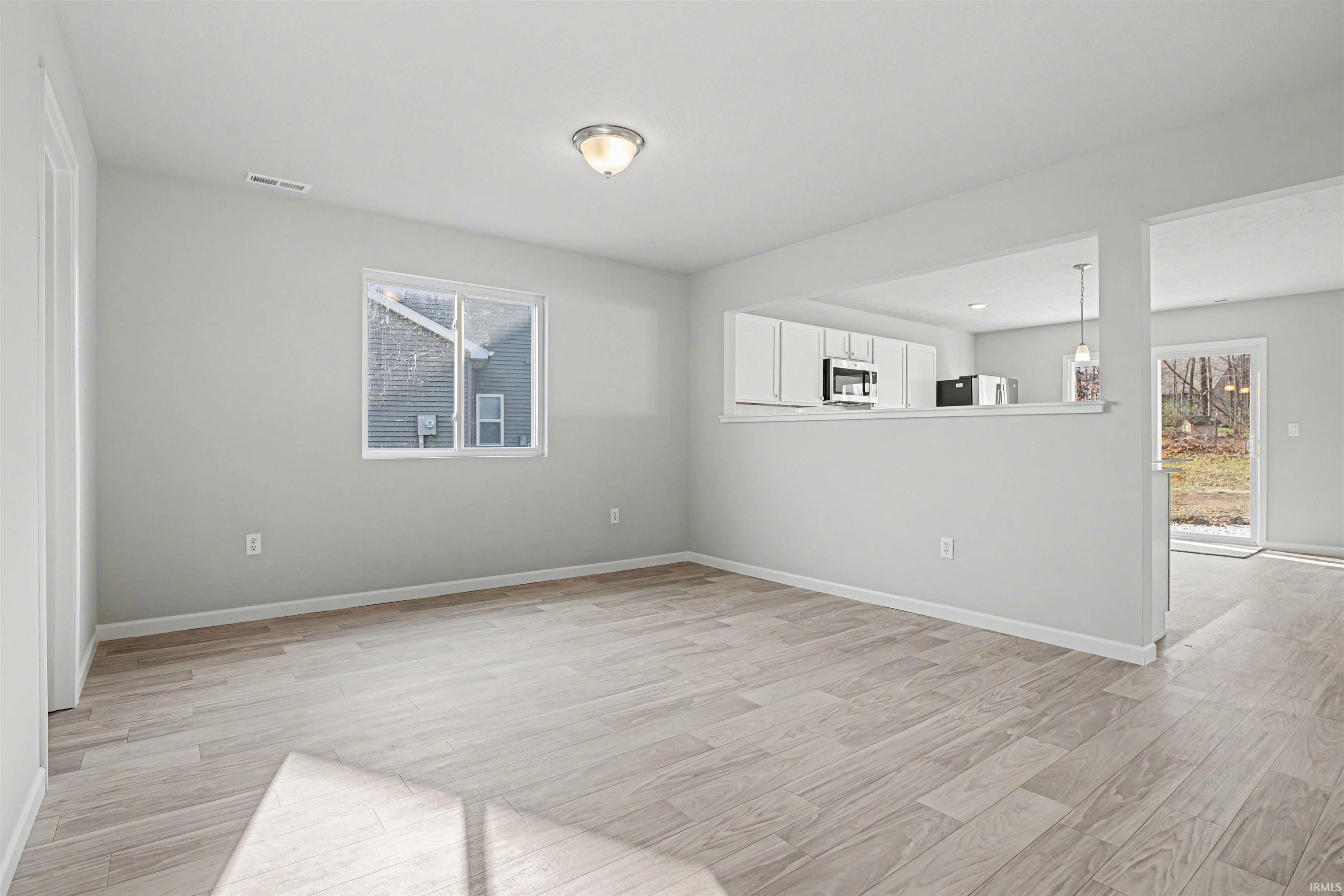 Large dining nook can serve as a formal & informal space since it can accommodate various table sizes and shapes.