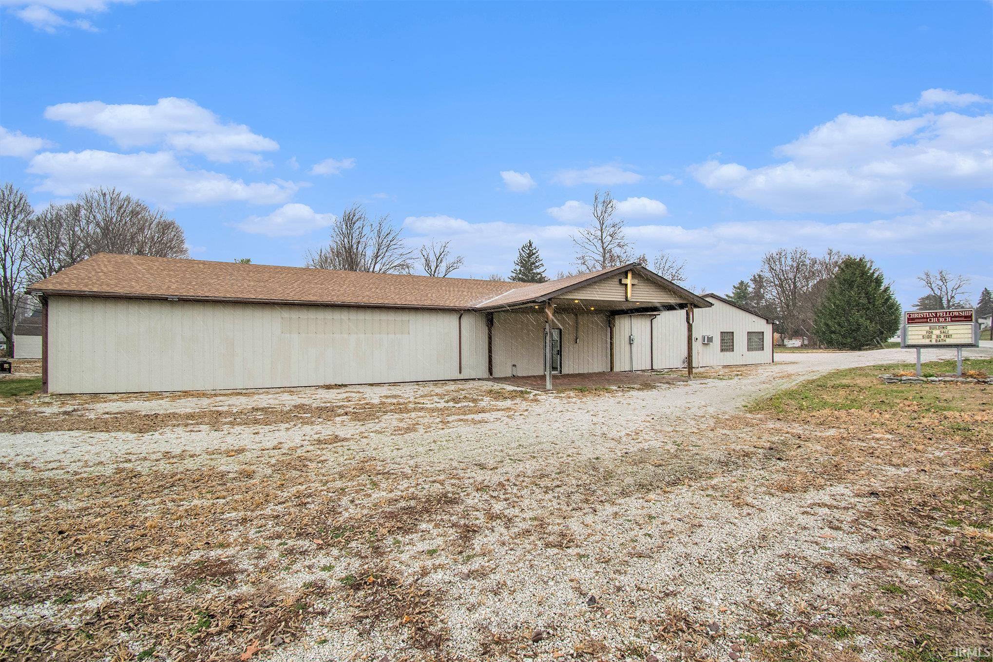 View of front of house with a patio