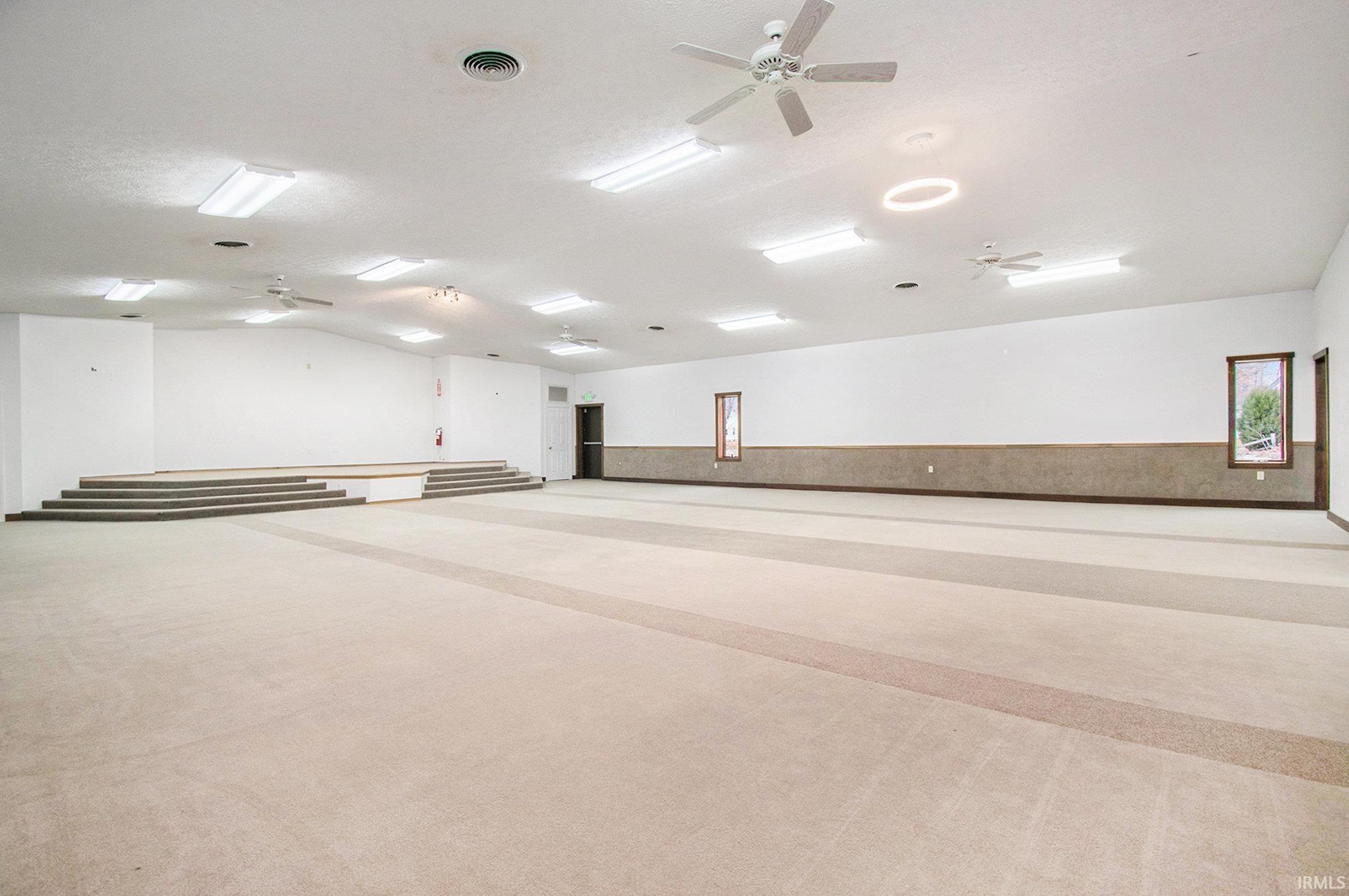 Misc room featuring a ceiling fan