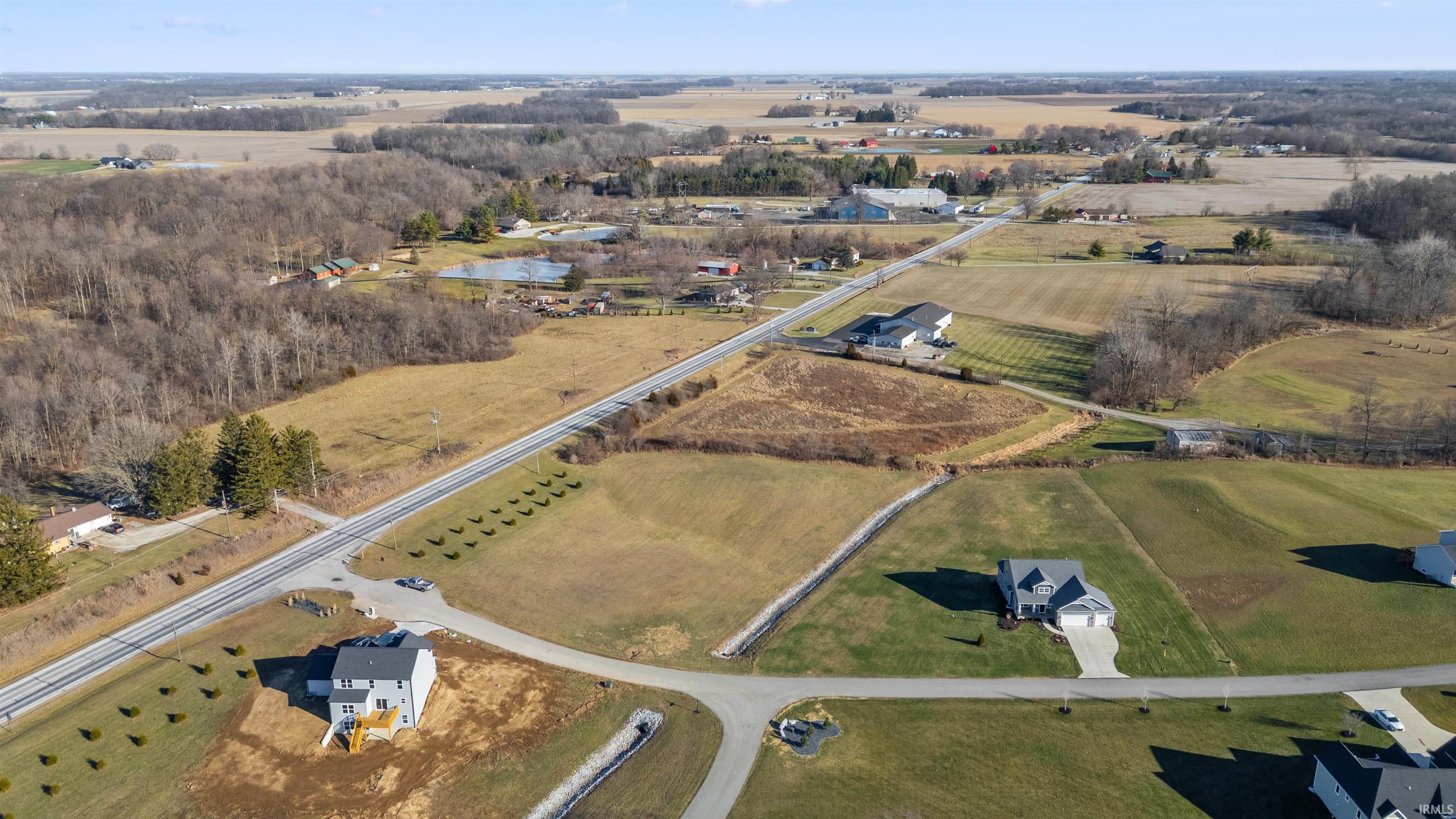 Aerial view of property's location featuring rural landscape