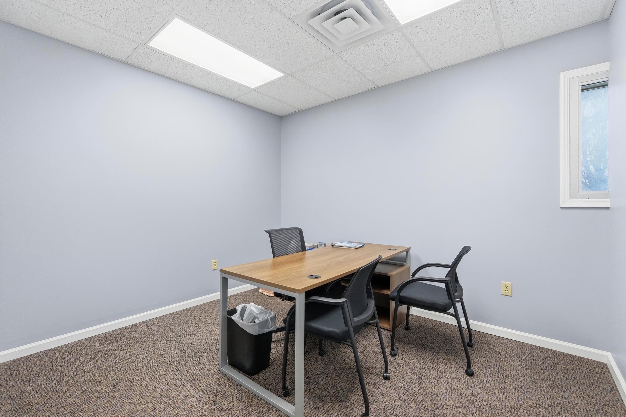 Home office featuring a paneled ceiling