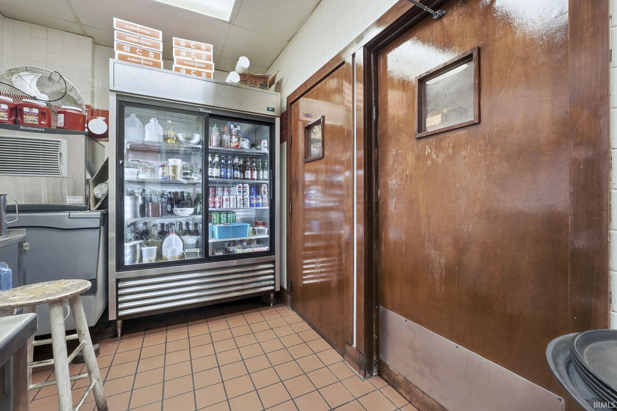 Interior space featuring a paneled ceiling