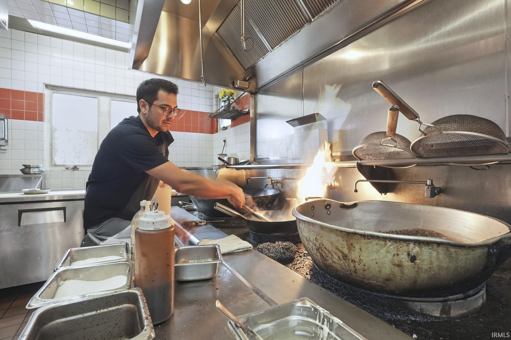 Detailed view of tile walls and tasteful backsplash