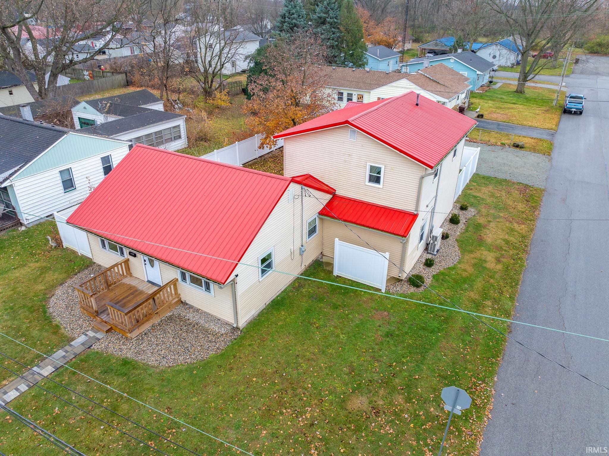 Aerial perspective of suburban area with property parcel outlined