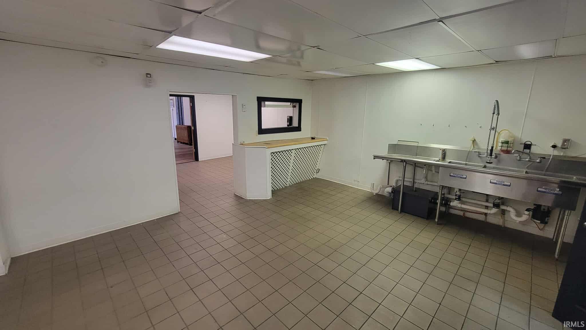 Kitchen with a paneled ceiling