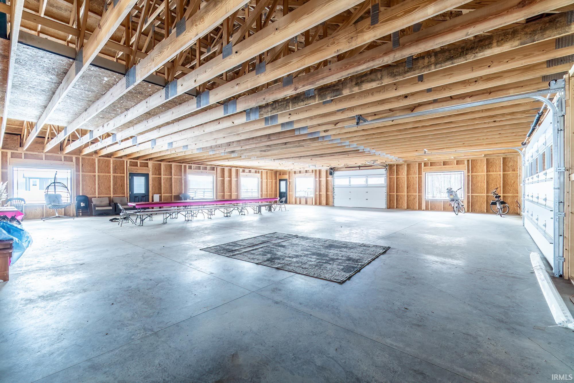 Misc room with concrete floors and a garage