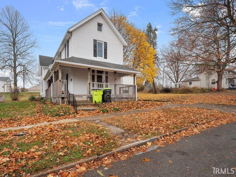 View of front of house with covered porch