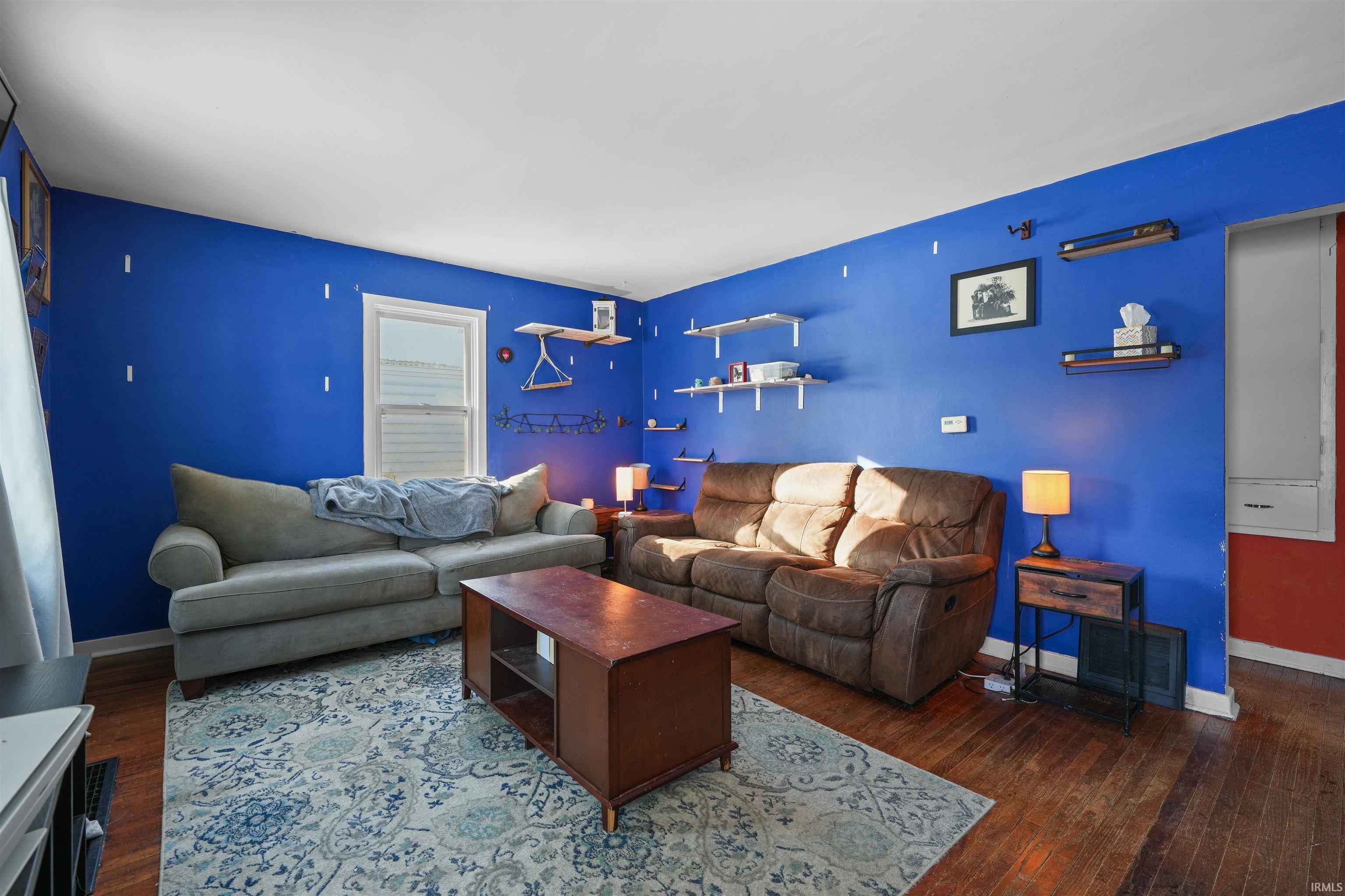 Living area with wood-style flooring