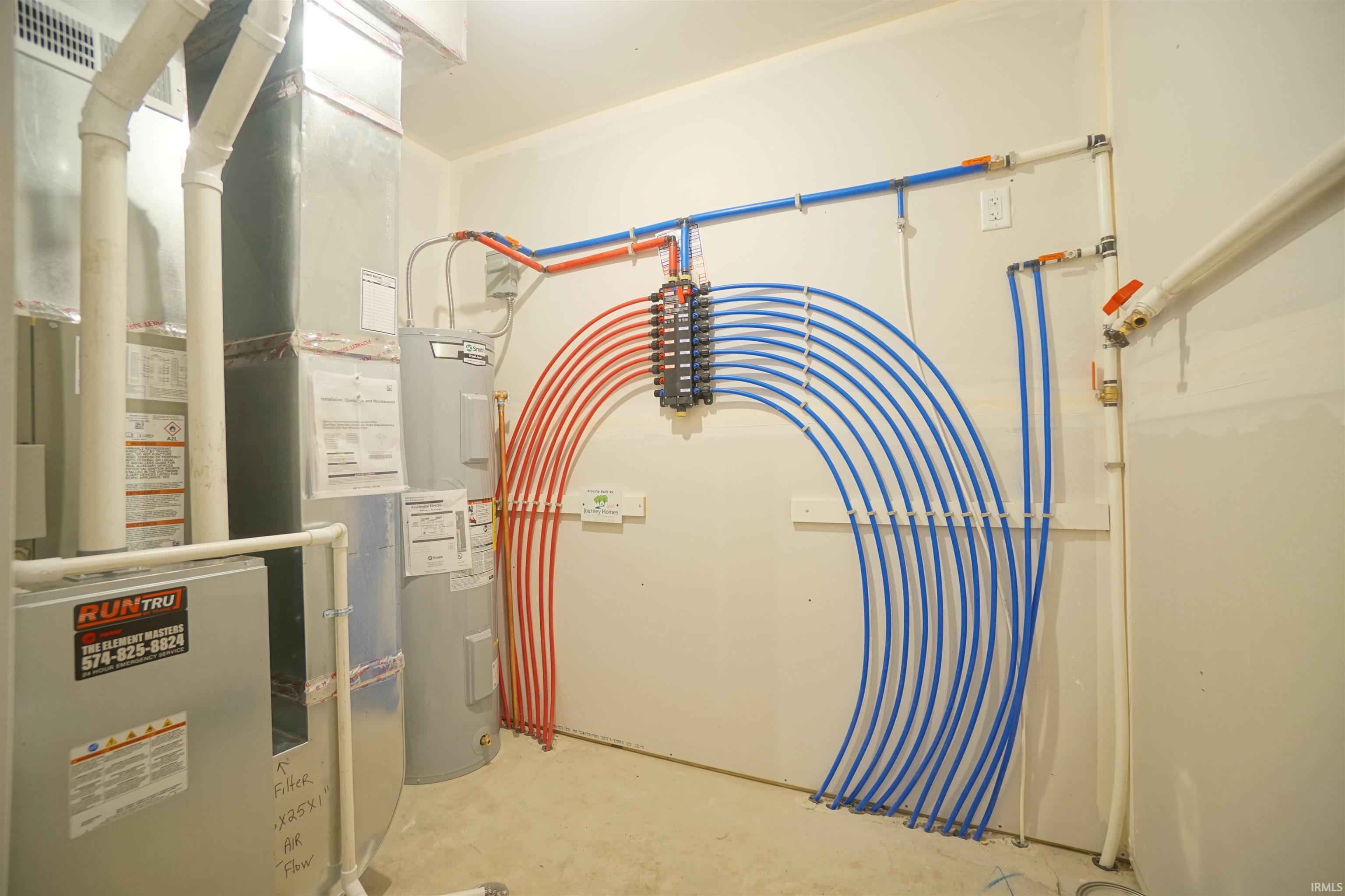 Utilities featuring heating unit and water heater