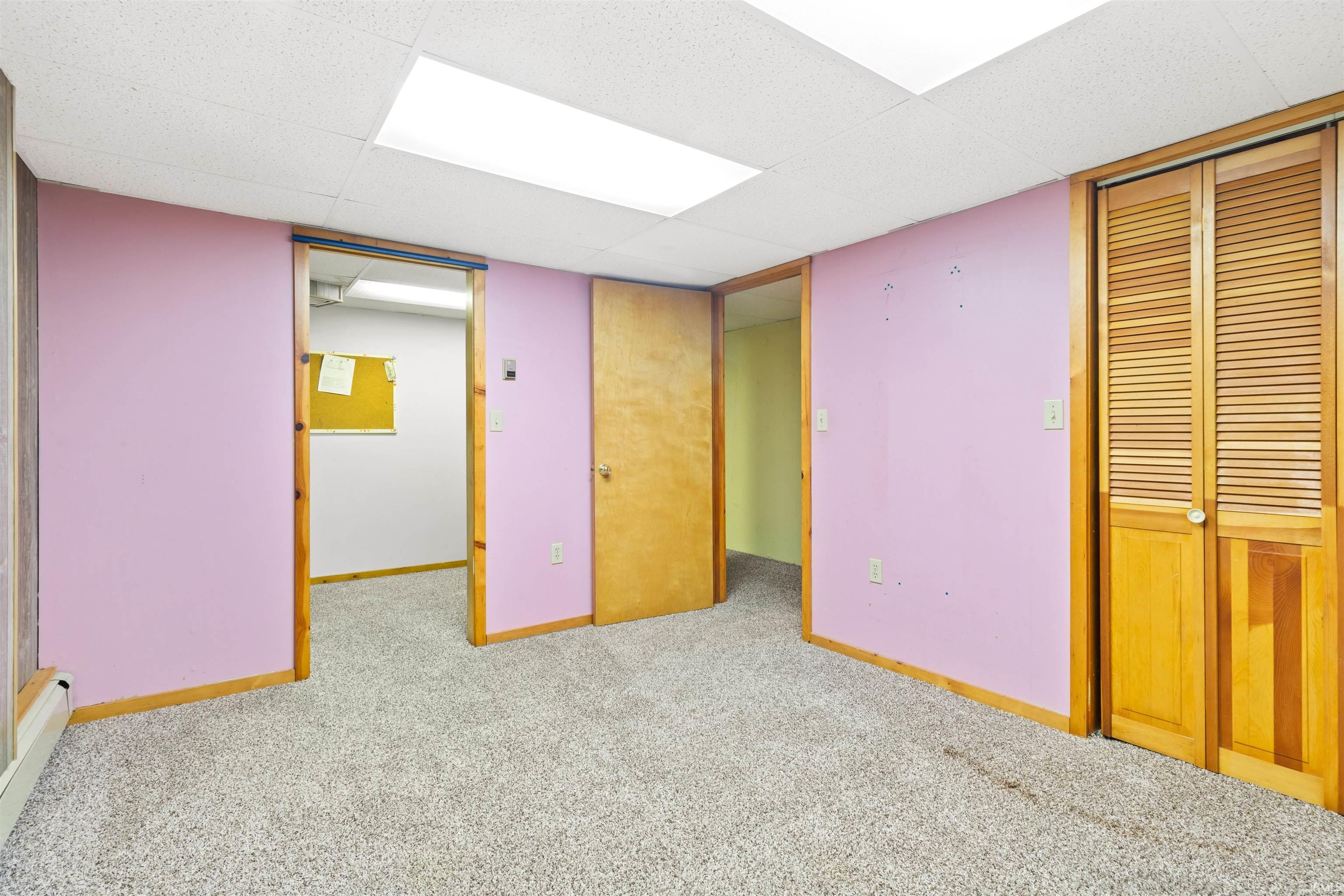 Unfurnished bedroom featuring a closet and carpet
