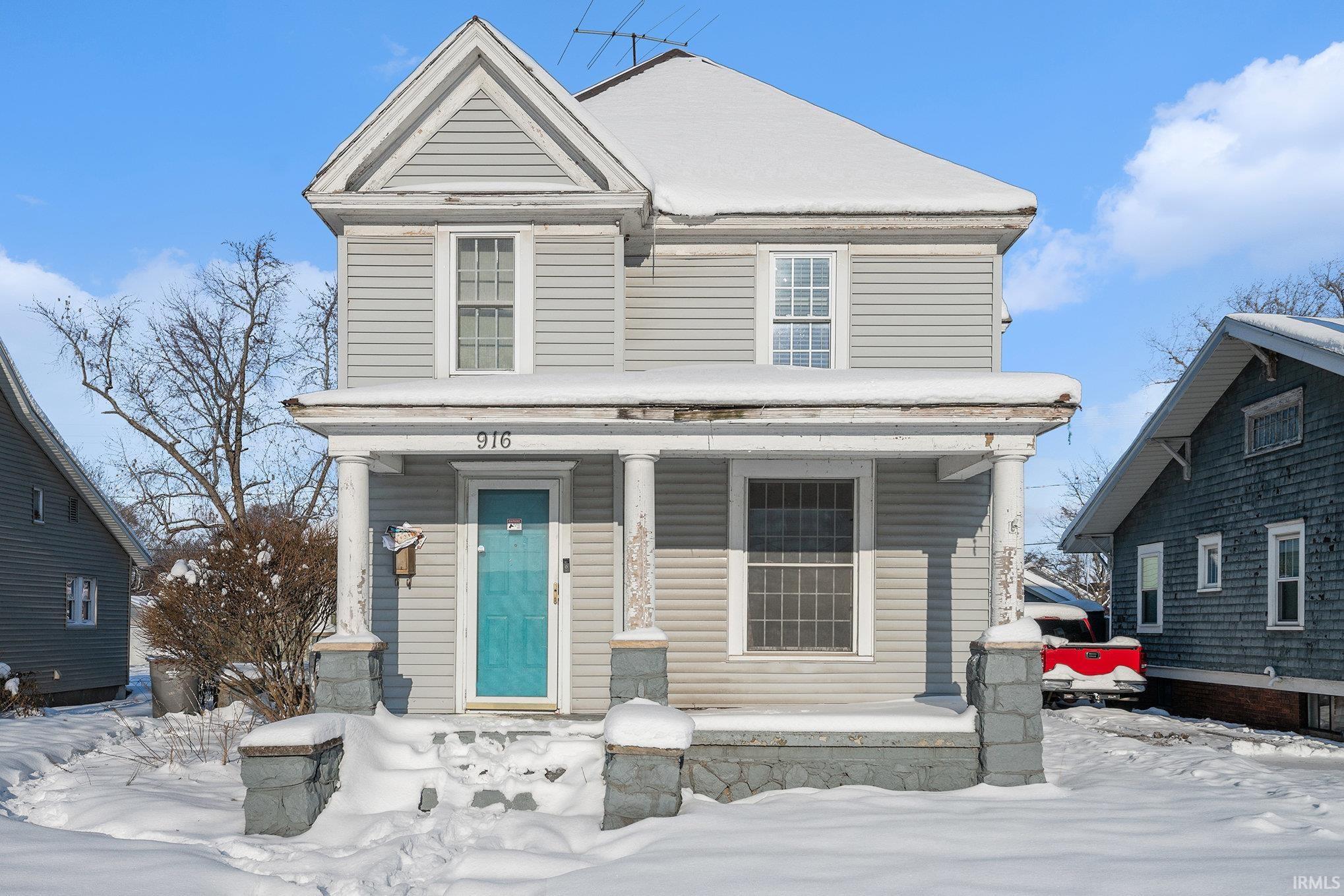 View of front facade with covered porch