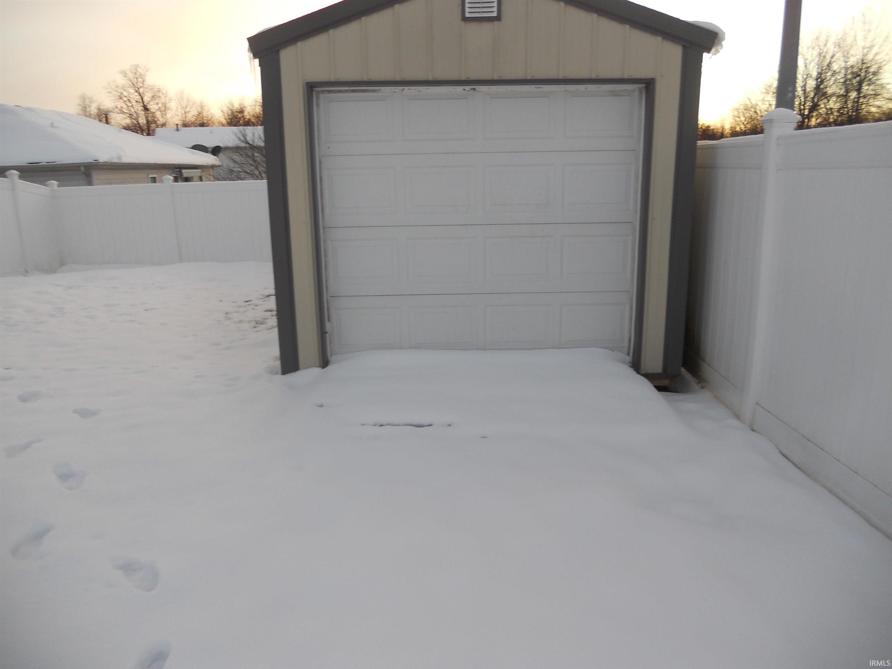 View of snow covered garage