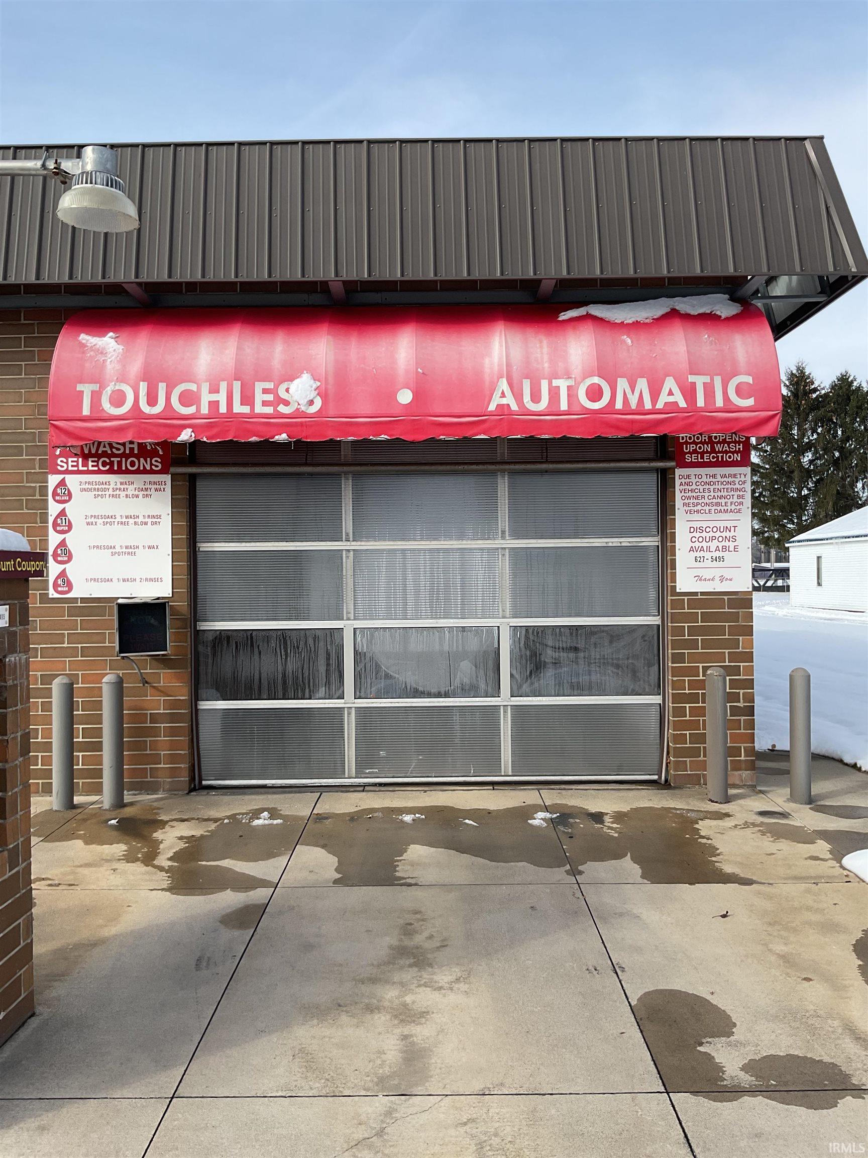 View of property with a garage