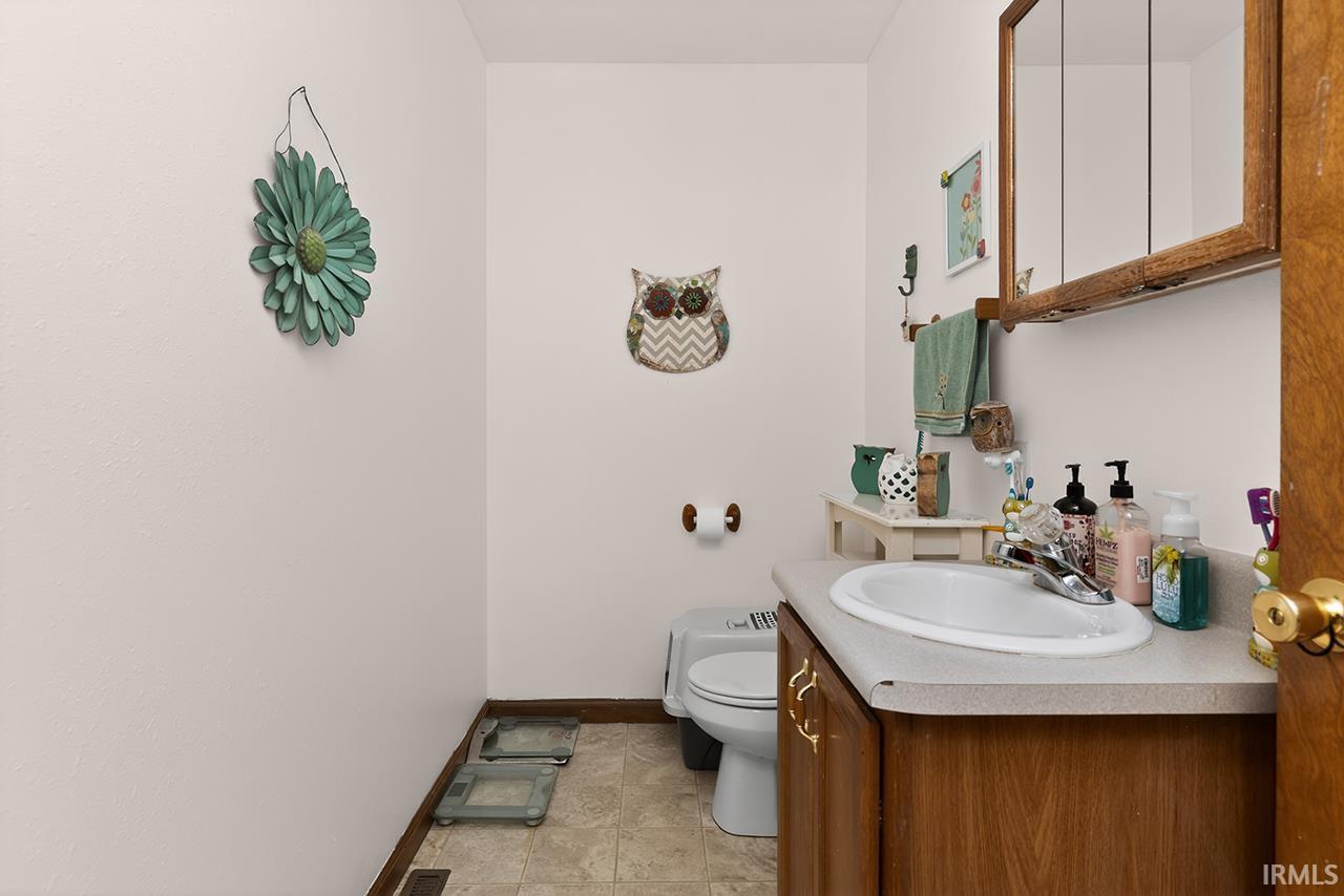 Bathroom with vanity and toilet