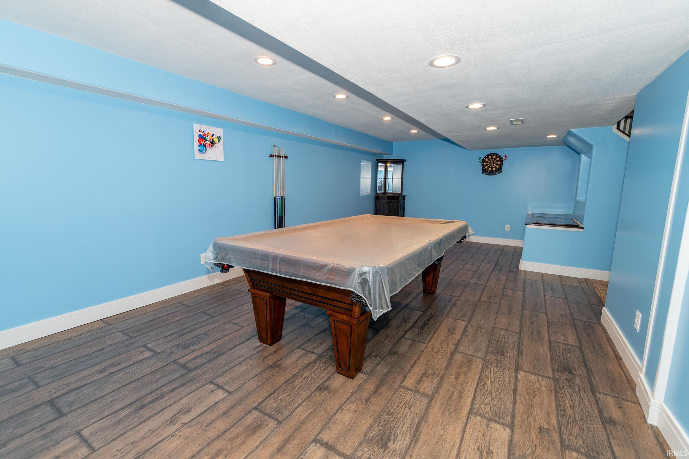 Game room featuring billiards table, dark wood-style flooring, and recessed lighting