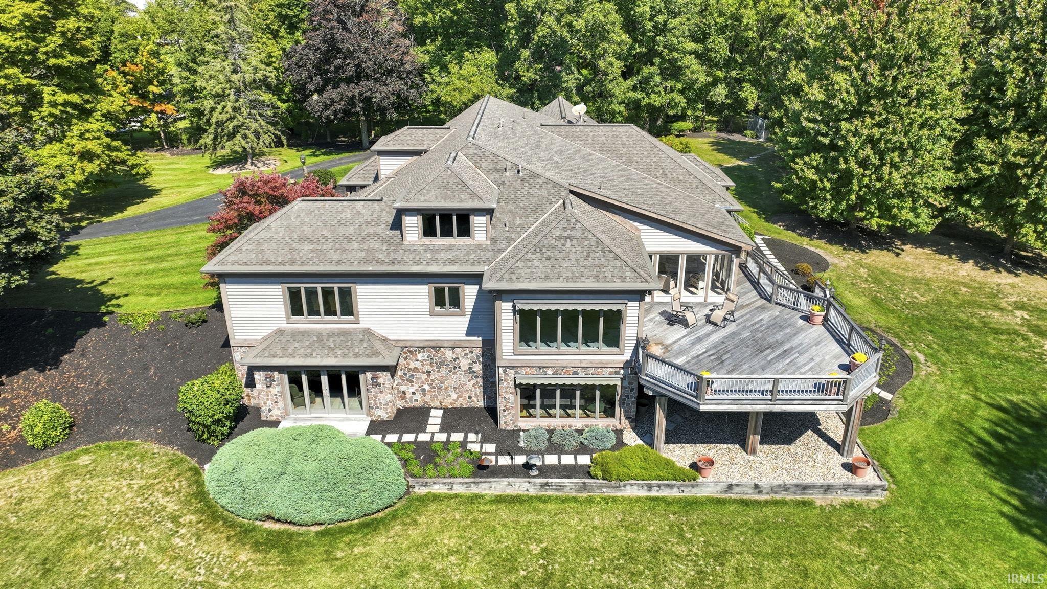 Snow covered garage featuring a garage