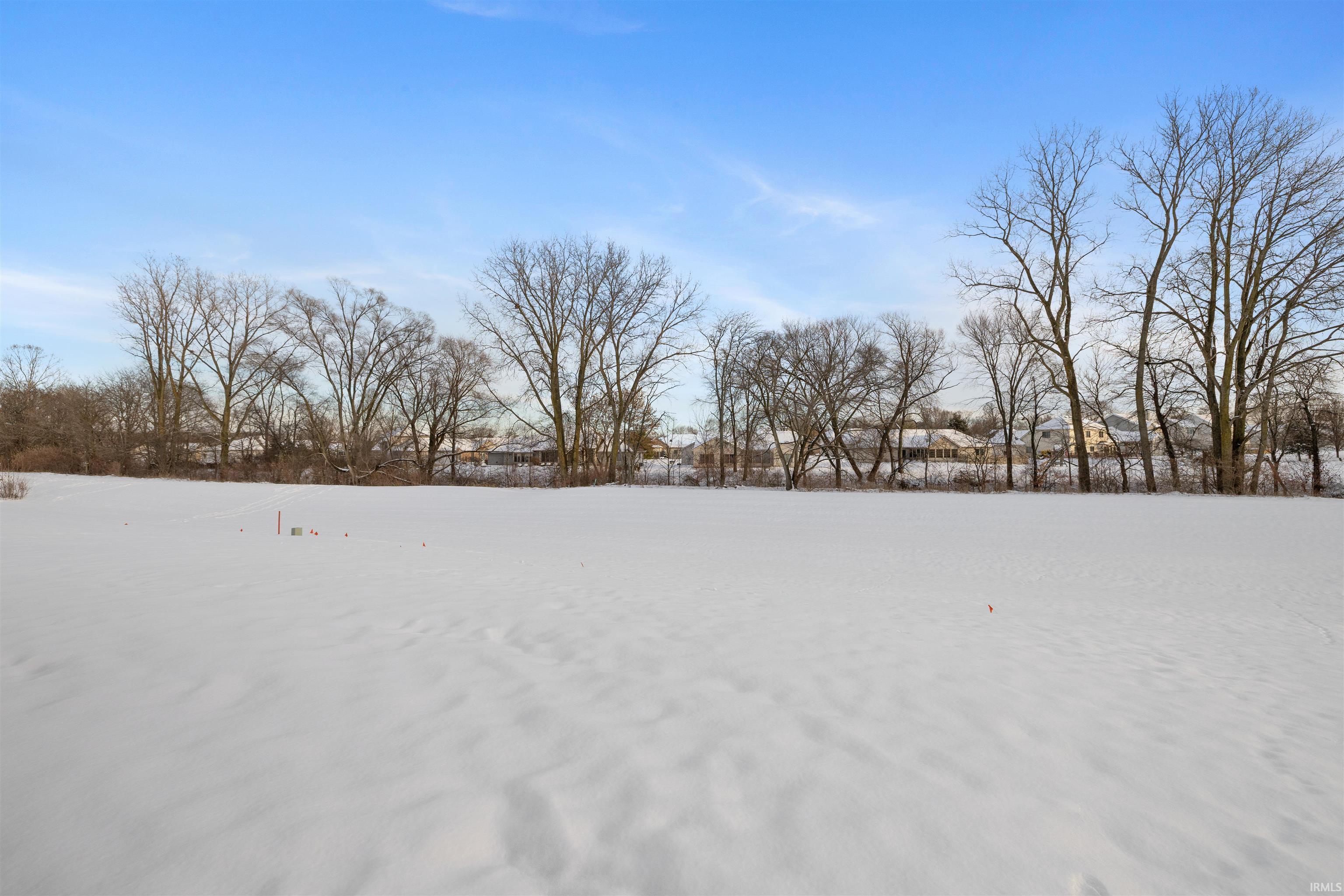 View of yard covered in snow