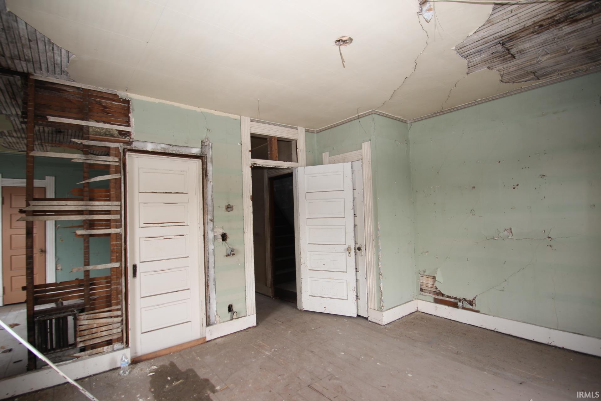 Unfurnished bedroom with a closet